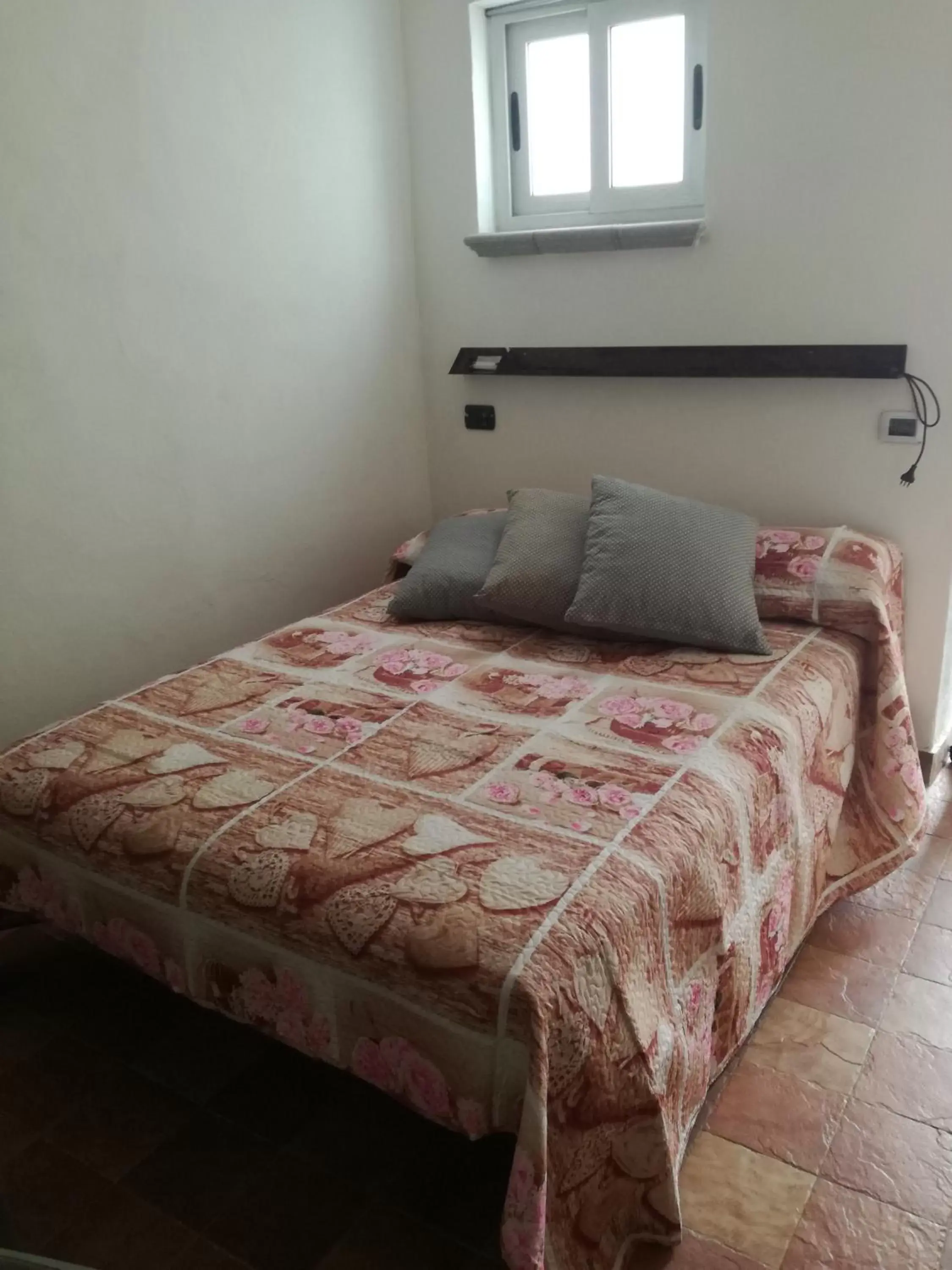 Bed in B&B PompeiLog