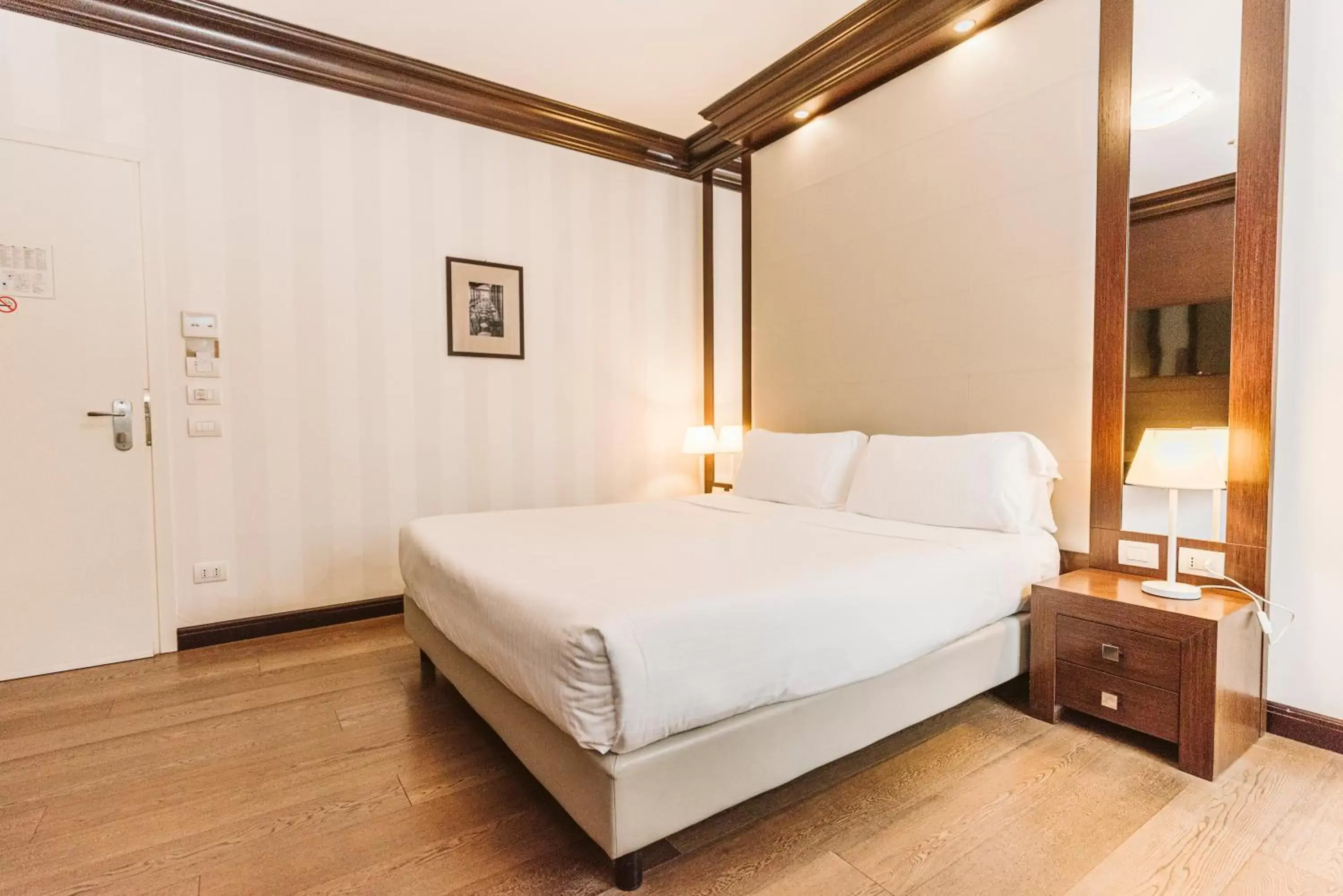 Bed in Palazzo Bezzi Hotel