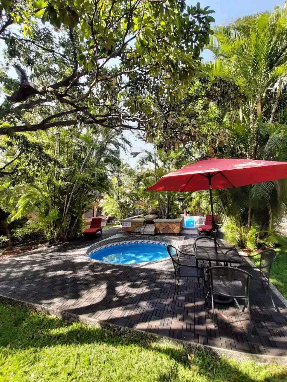 Patio, Swimming Pool in Palmareca Inn-Suites-Studio