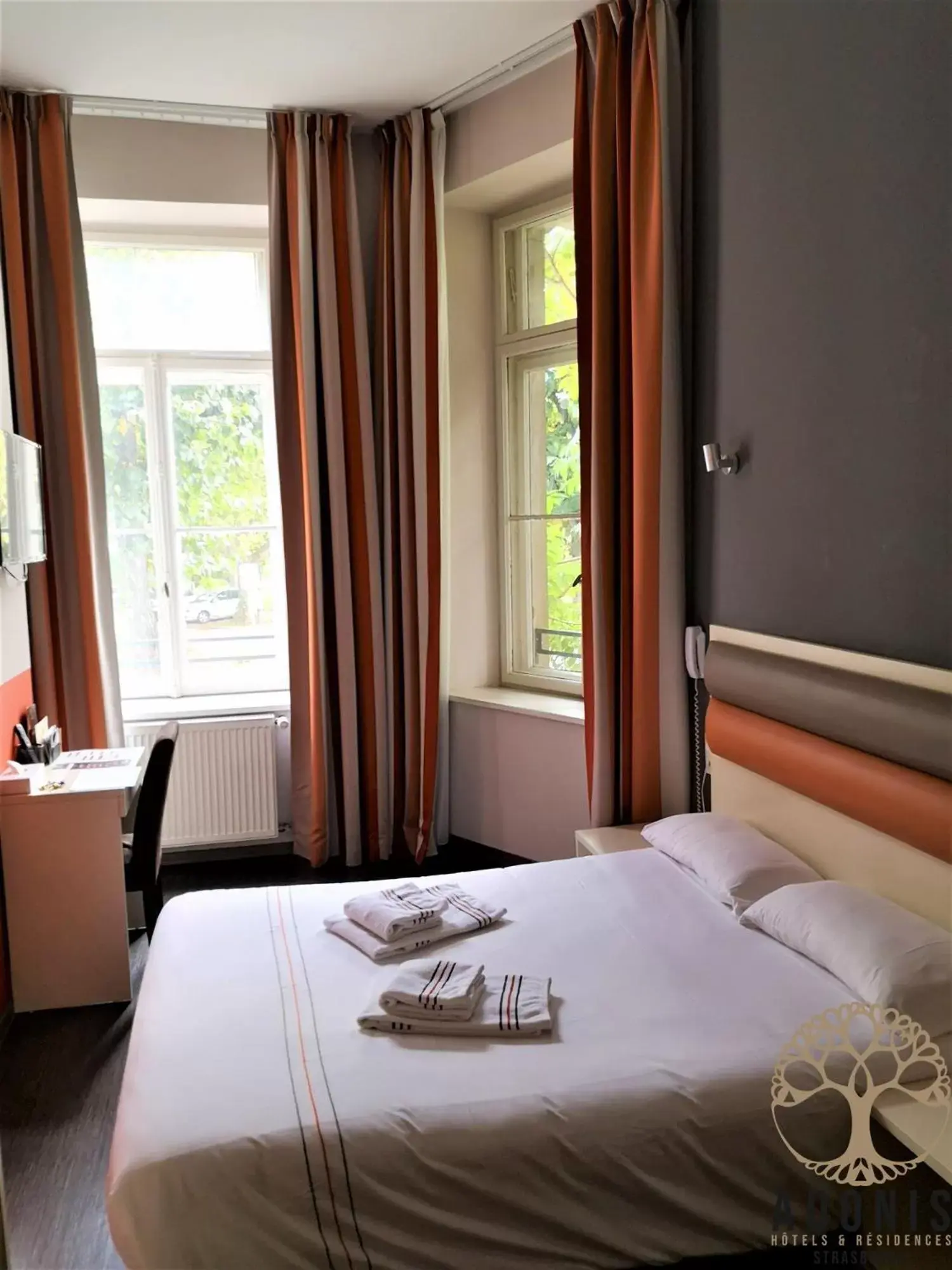 Photo of the whole room, Bed in Adonis Hotel Strasbourg