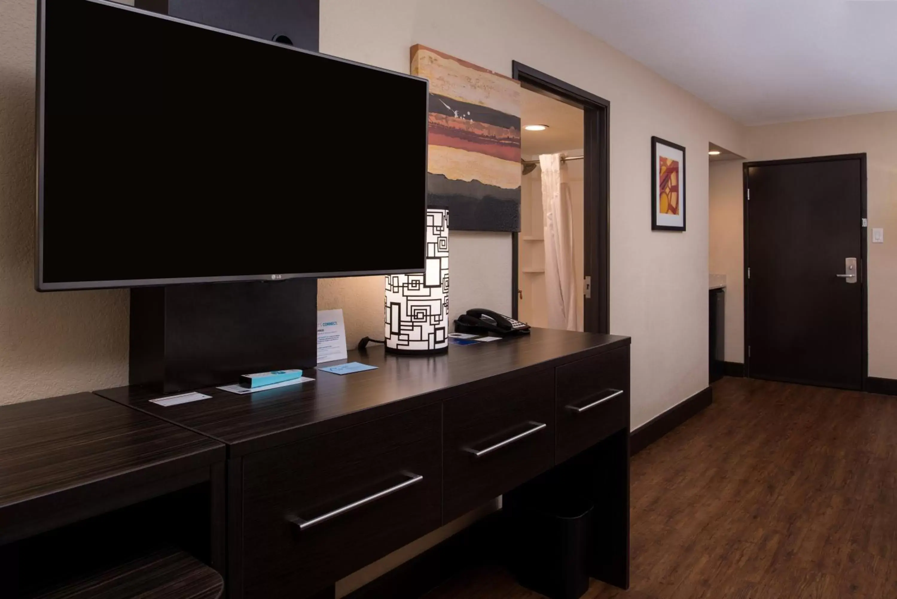 Photo of the whole room, TV/Entertainment Center in Holiday Inn Express & Suites San Antonio Medical Center North, an IHG Hotel