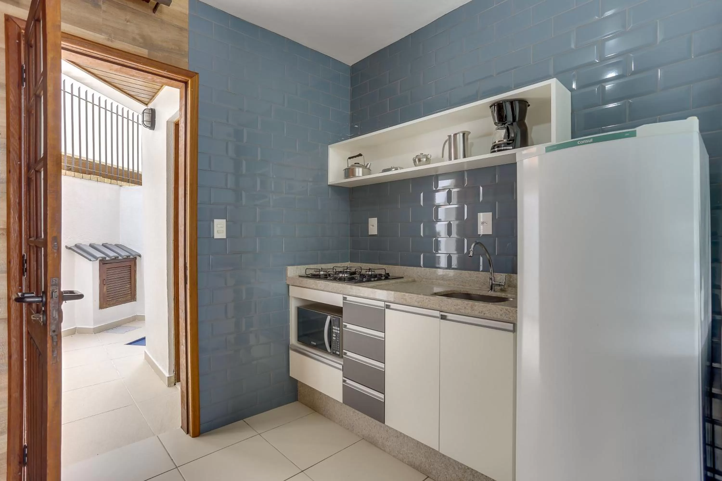 Kitchen or kitchenette in Pousada Saint Paul