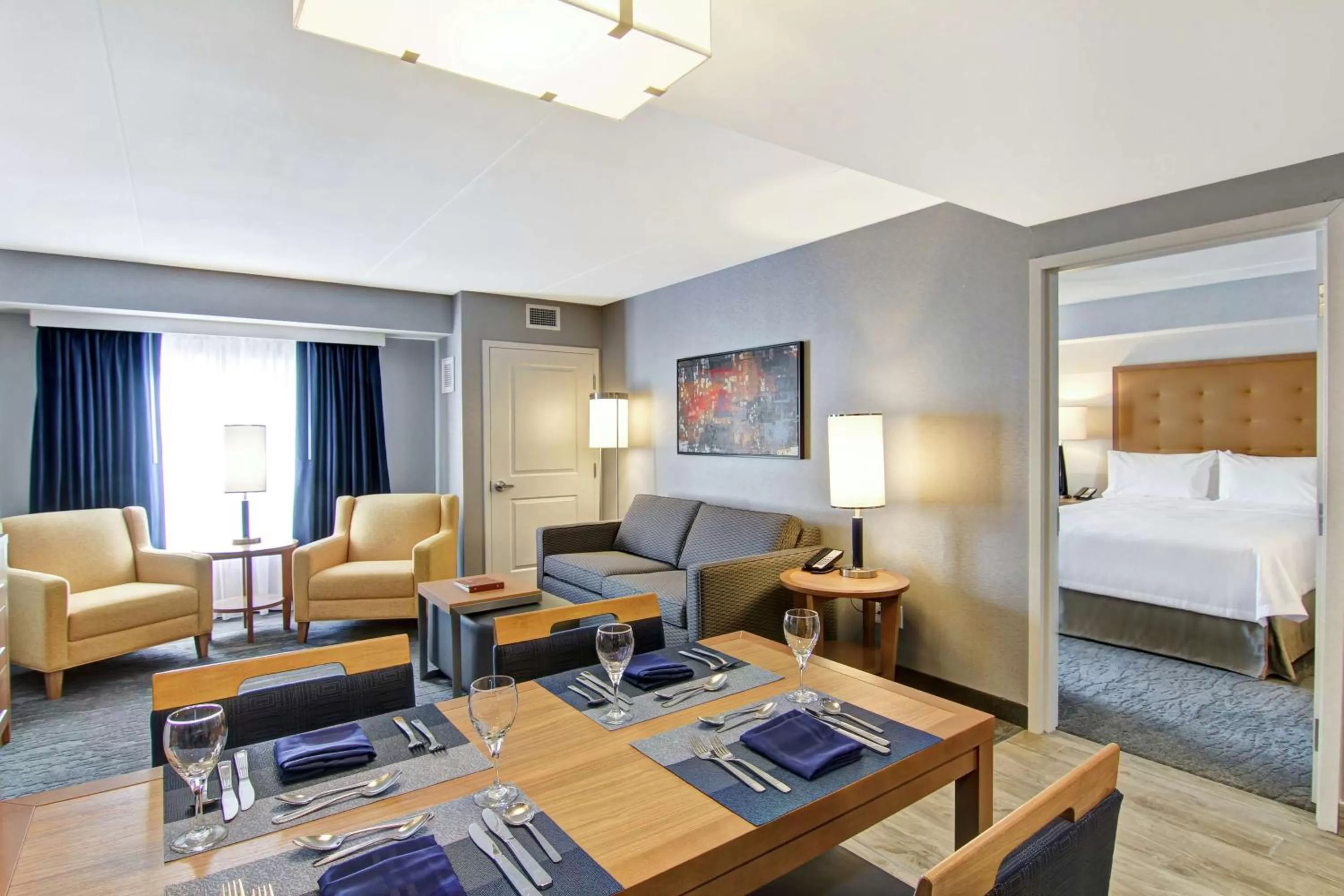 Living room, Bed in Homewood Suites By Hilton Ottawa Kanata