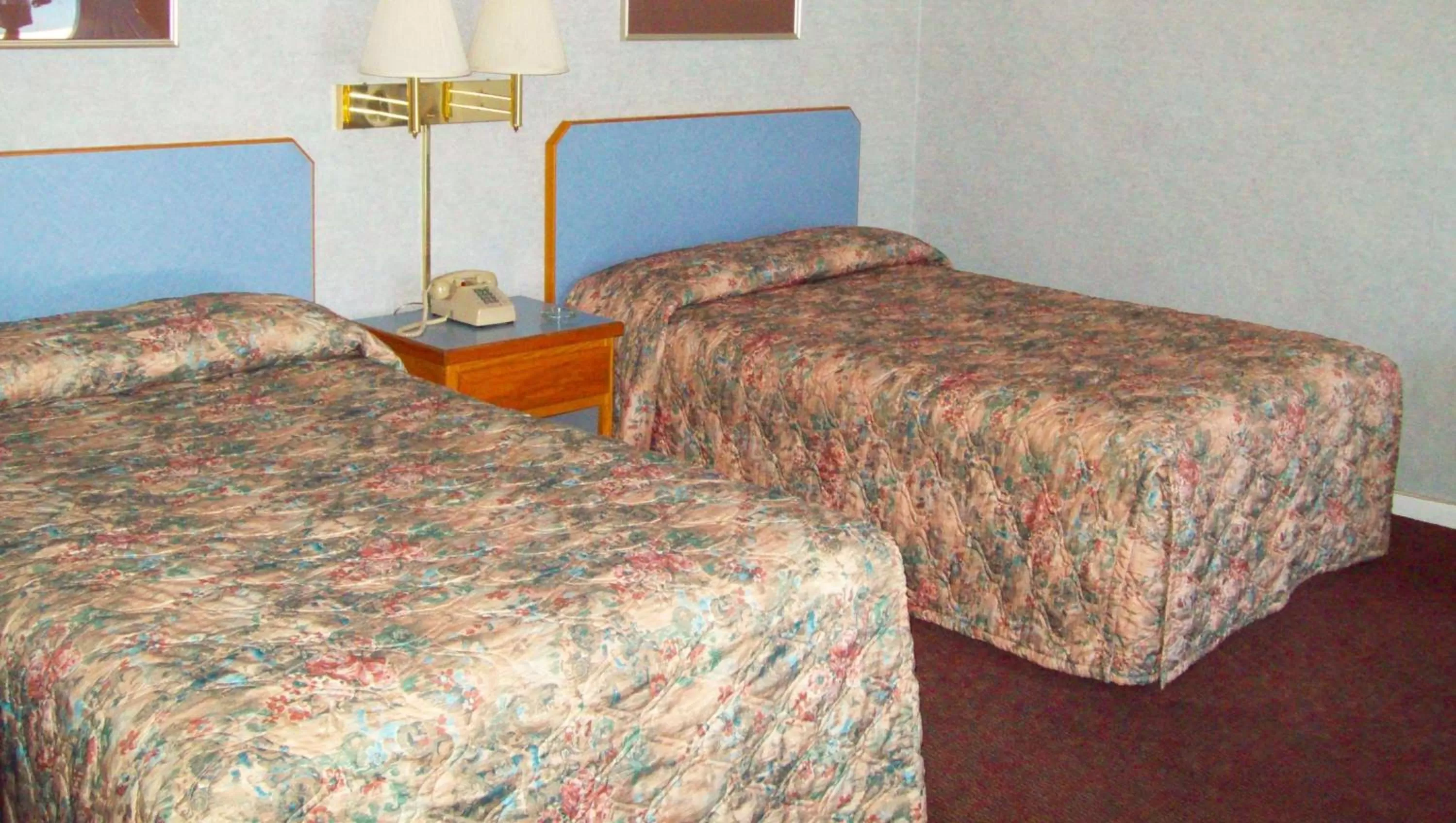 Photo of the whole room, Bed in Blue Mist Motel Florence