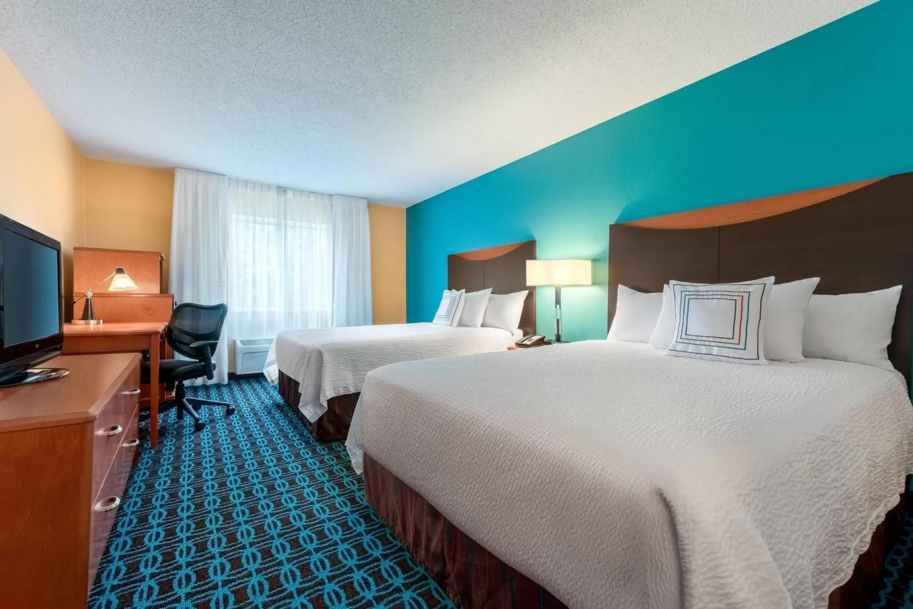 Photo of the whole room, Bed in Fairfield Inn & Suites Stevens Point