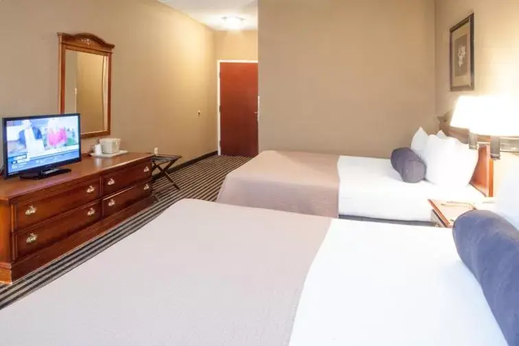 Bed in Mountain Inn & Suites Flat Rock