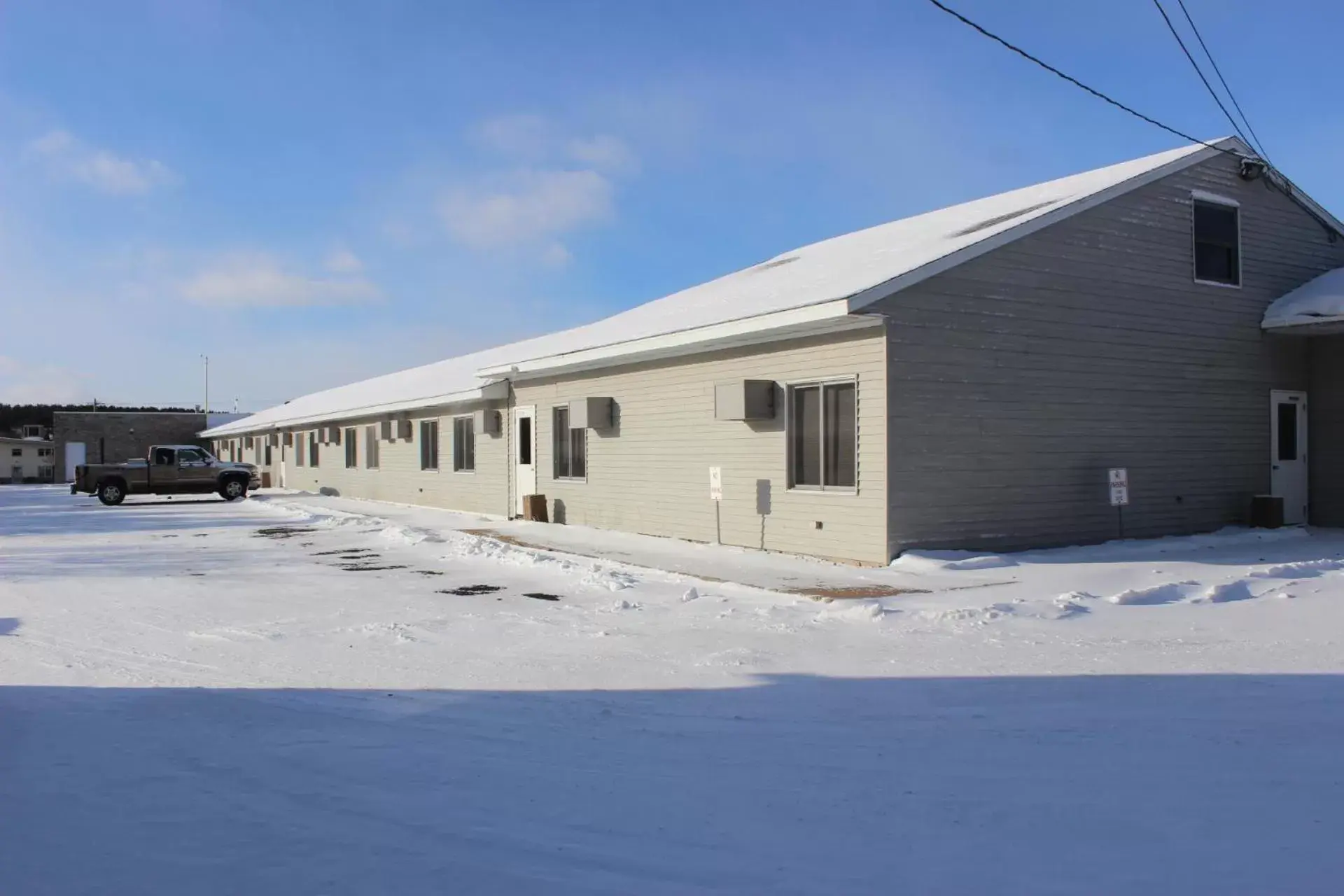 Property building, Winter in Woodland Inn & Suites