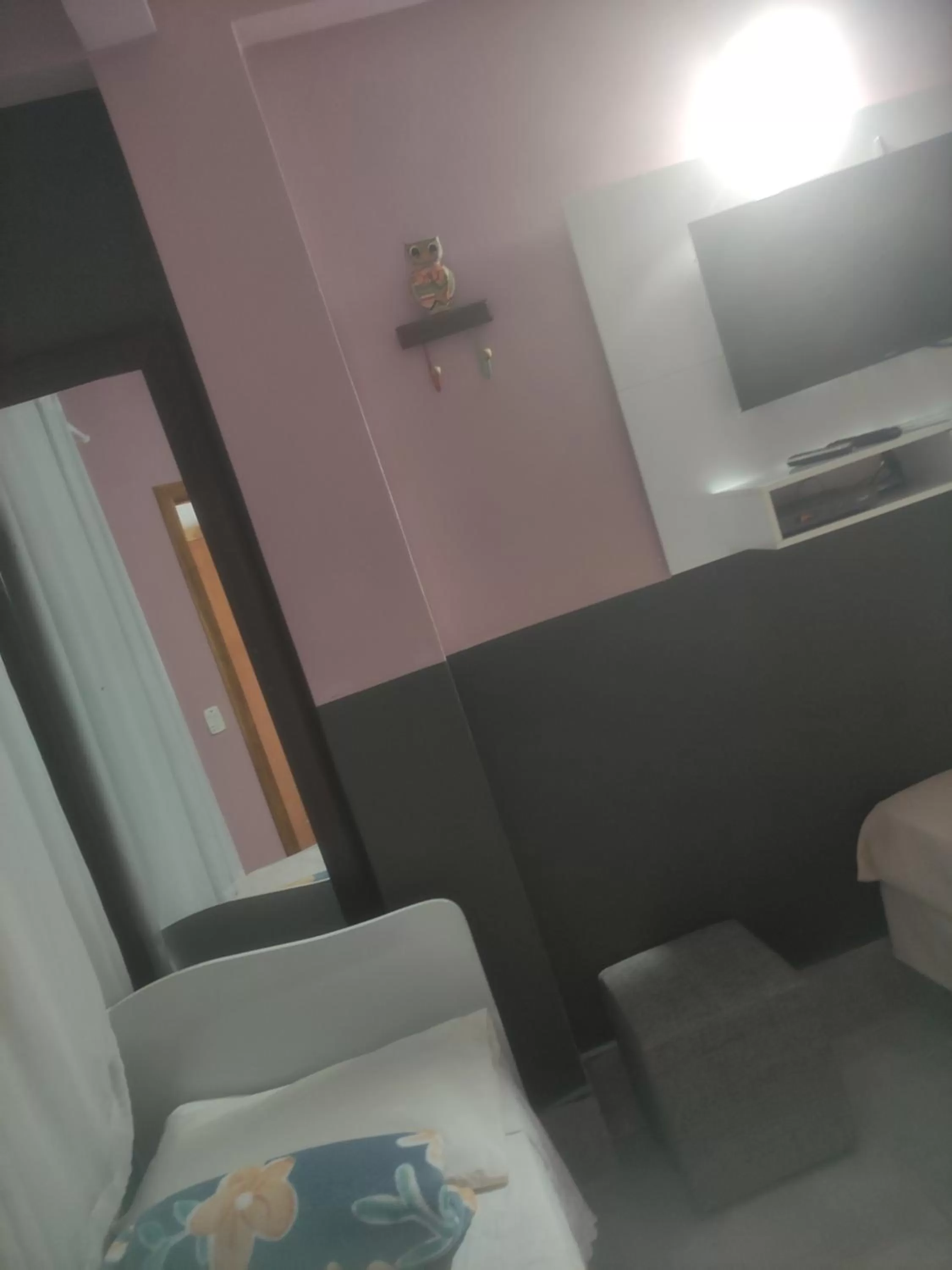 Bed in Pousada da Gi Suítes e Turismo