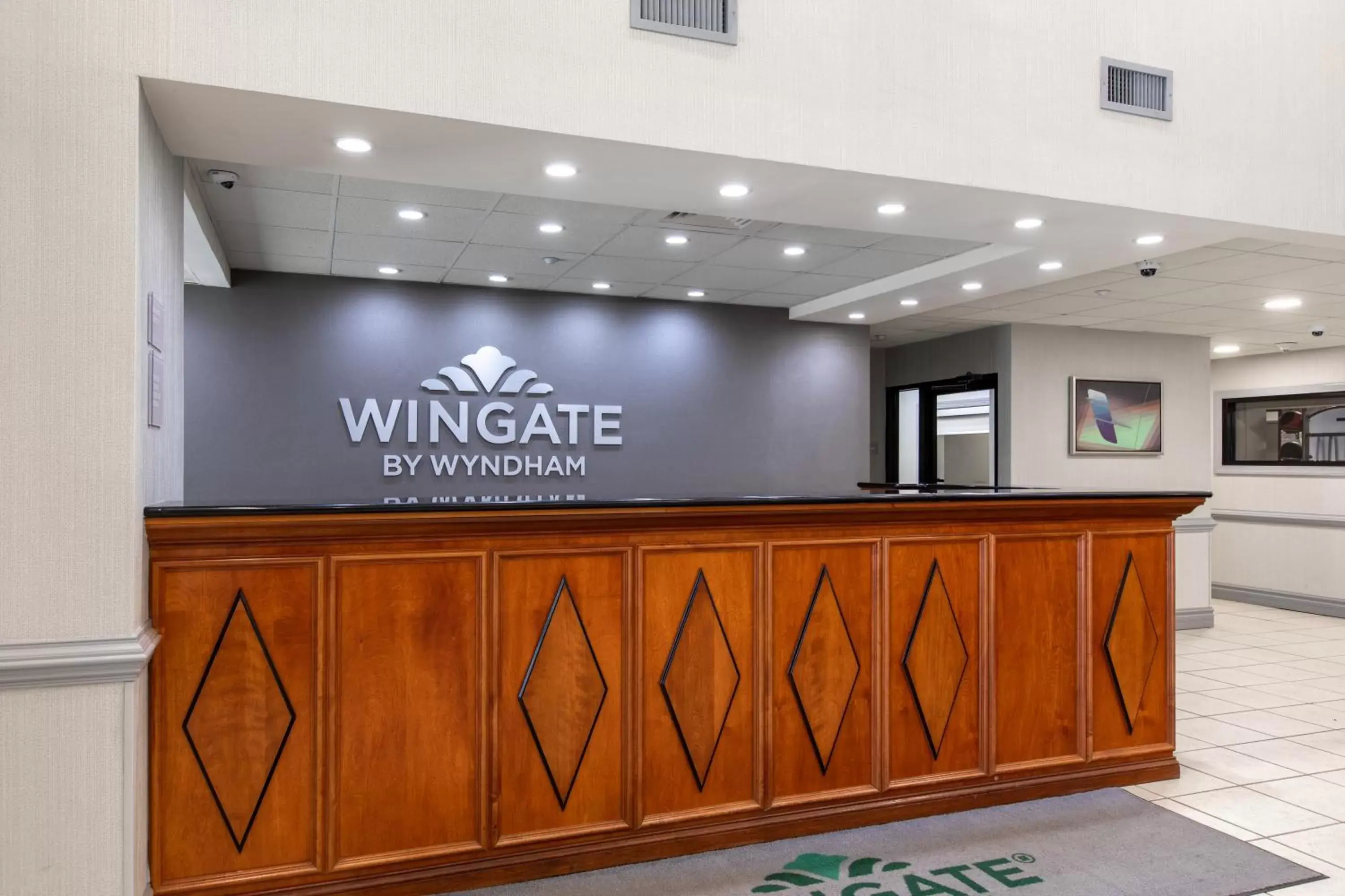 Lobby or reception in Wingate by Wyndham Charlotte Concord Mills/Speedway Lobby or reception in Wingate by Wyndham Charlotte Concord Mills/Speedway
