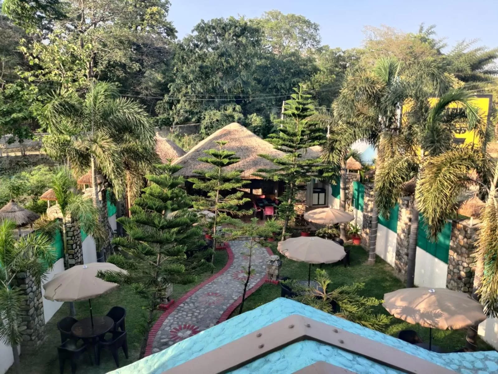 Property building, Pool View in The Corbett Jungle By JitaInn