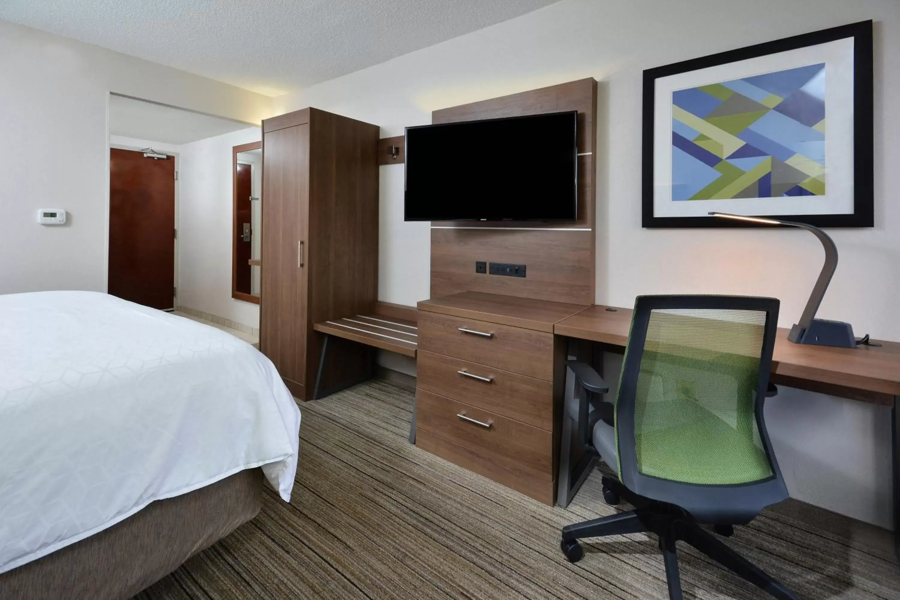 Photo of the whole room, TV/Entertainment Center in Holiday Inn Express Raleigh-Durham Airport, an IHG Hotel