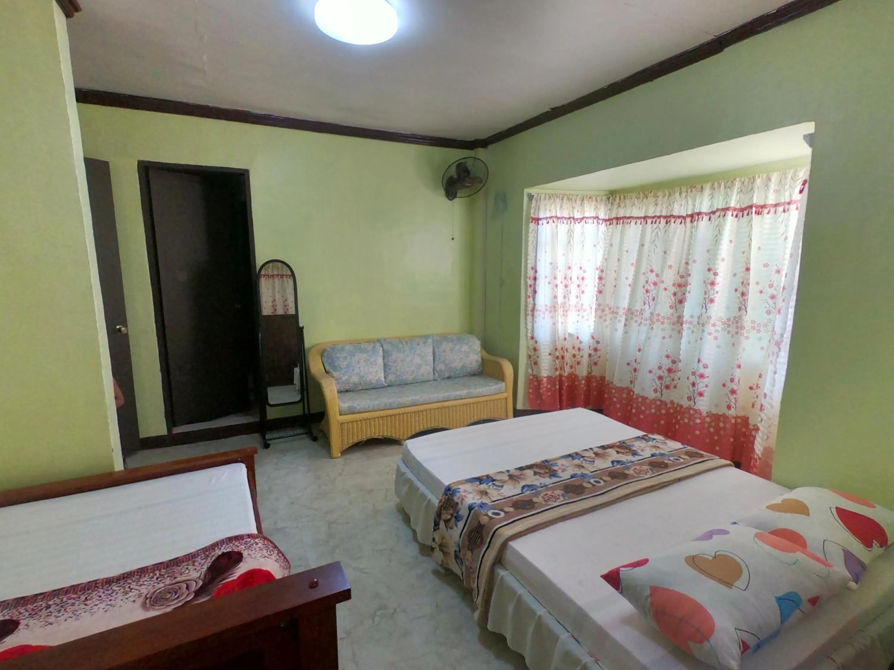 Bed in Bohol Sea Breeze Cottages and Resort
