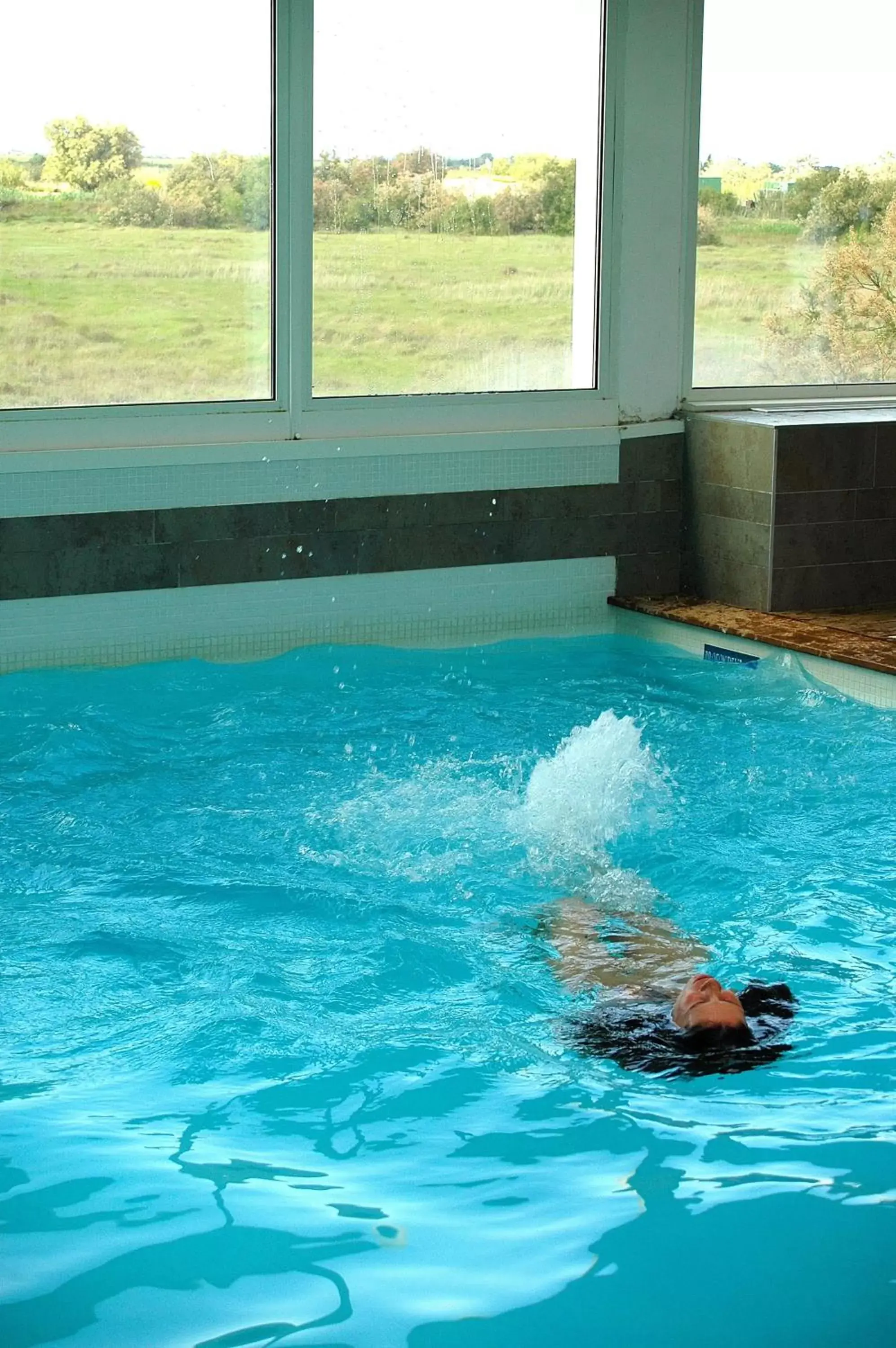 People, Swimming Pool in Résidence Hôtelière Natureva & Spa