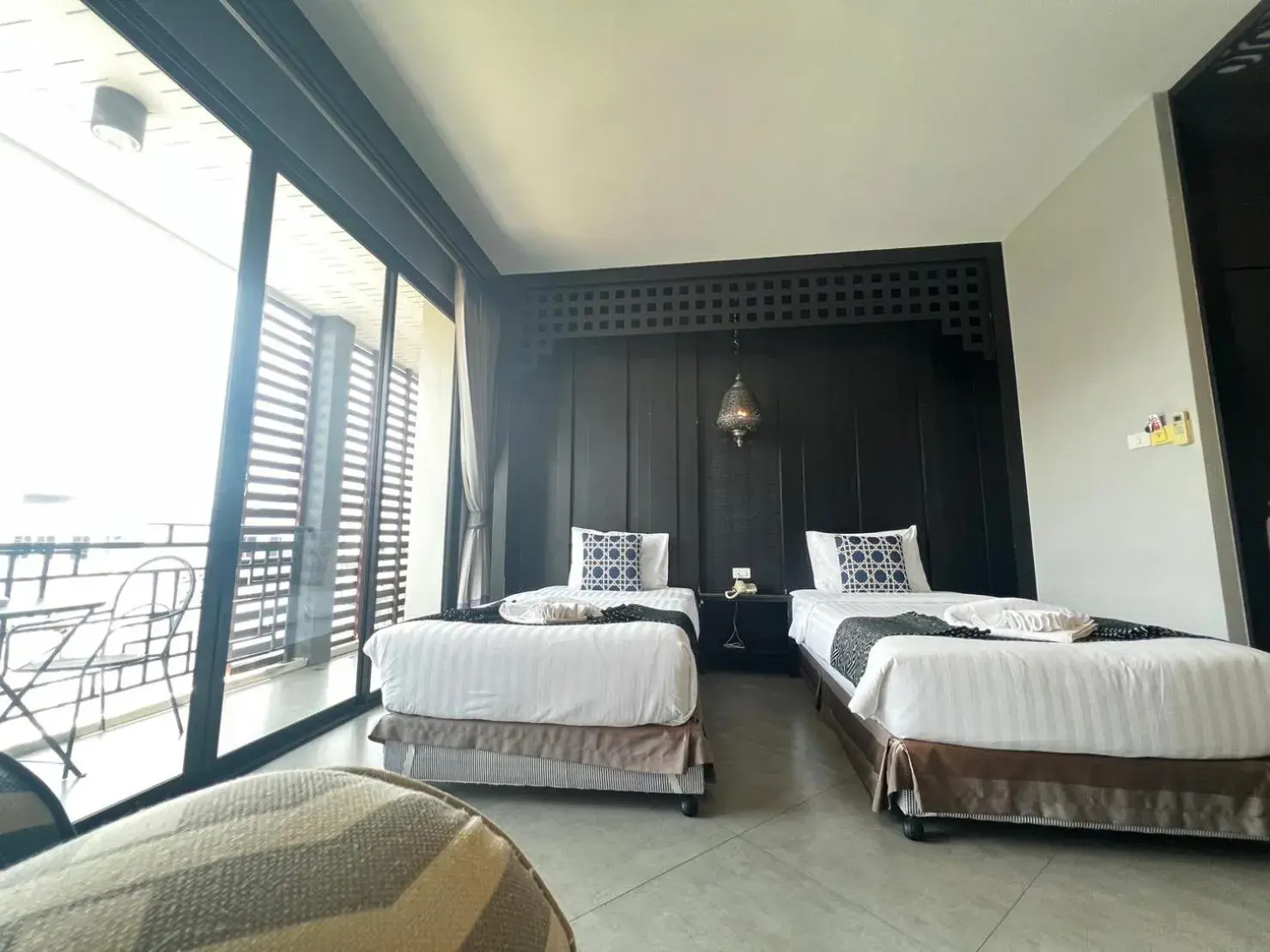 Bed in Srisawara Casa Hotel