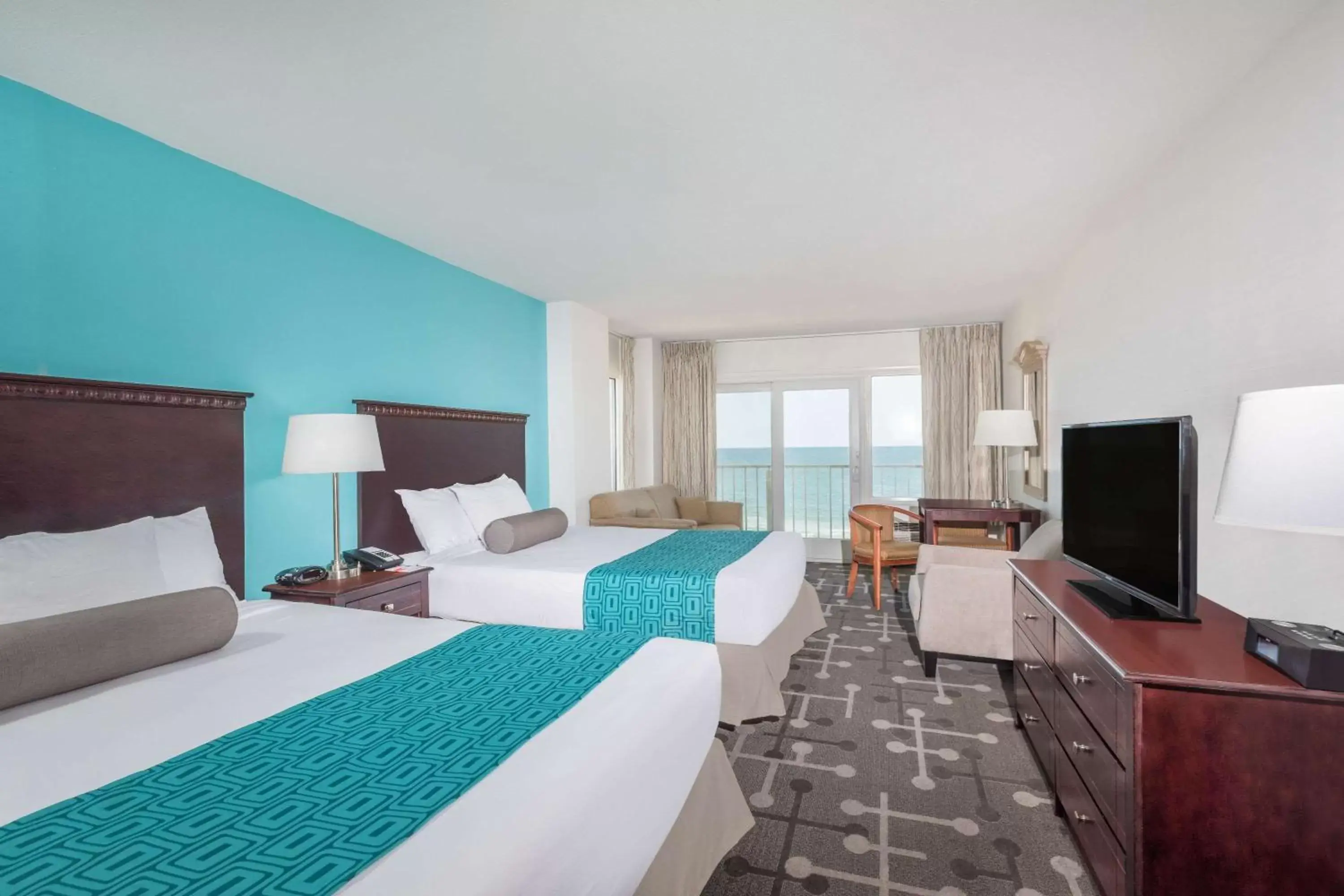 Photo of the whole room, TV/Entertainment Center in Howard Johnson Plaza by Wyndham Ocean City Oceanfront