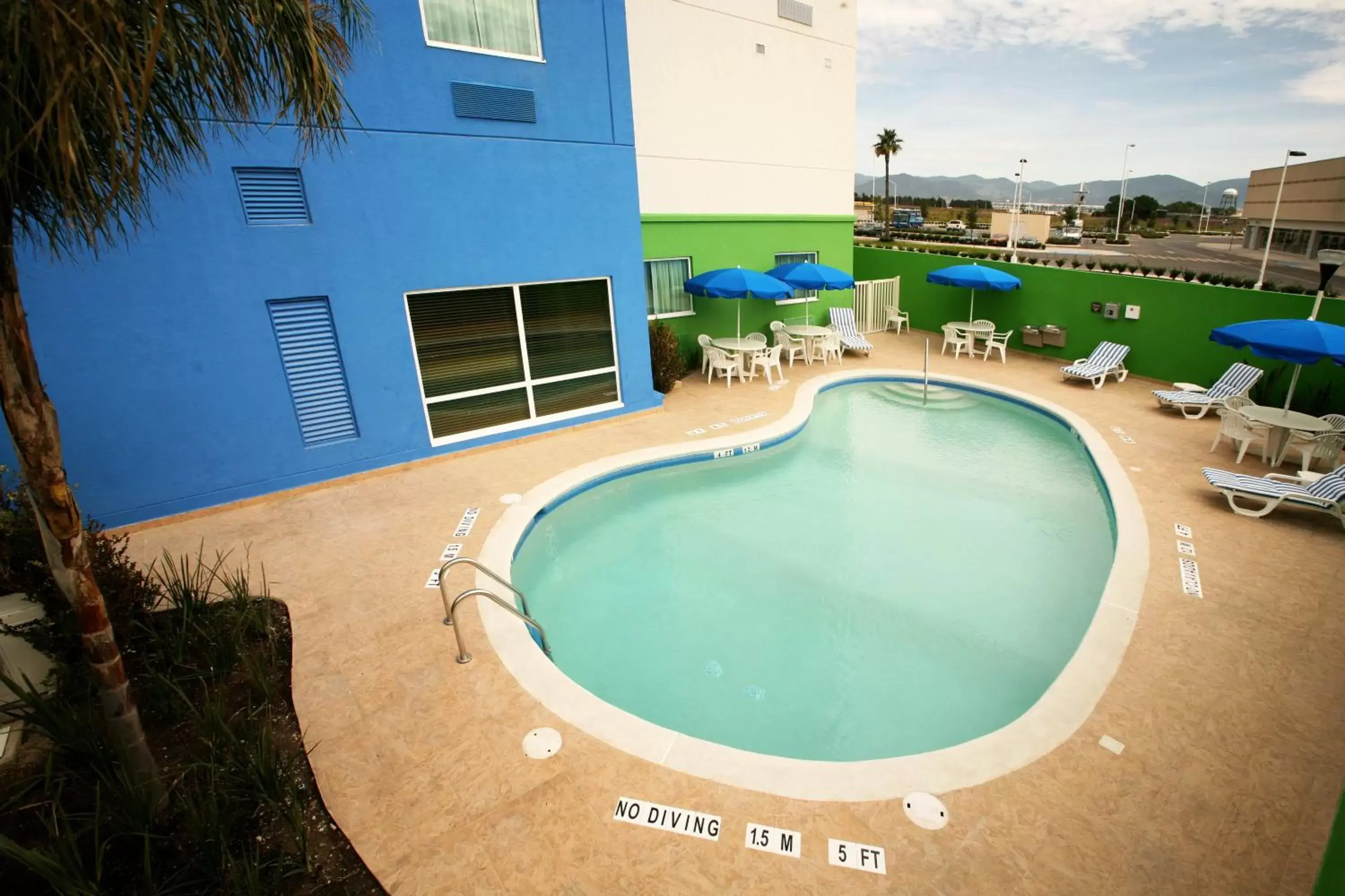 Swimming pool, Pool View in Holiday Inn Express & Suites Toluca Zona Aeropuerto, an IHG Hotel