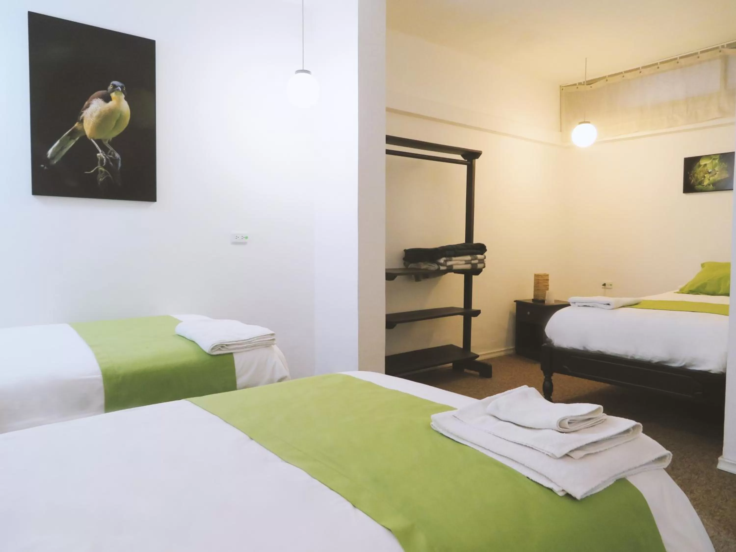 Bed in Bird Garden Guest House