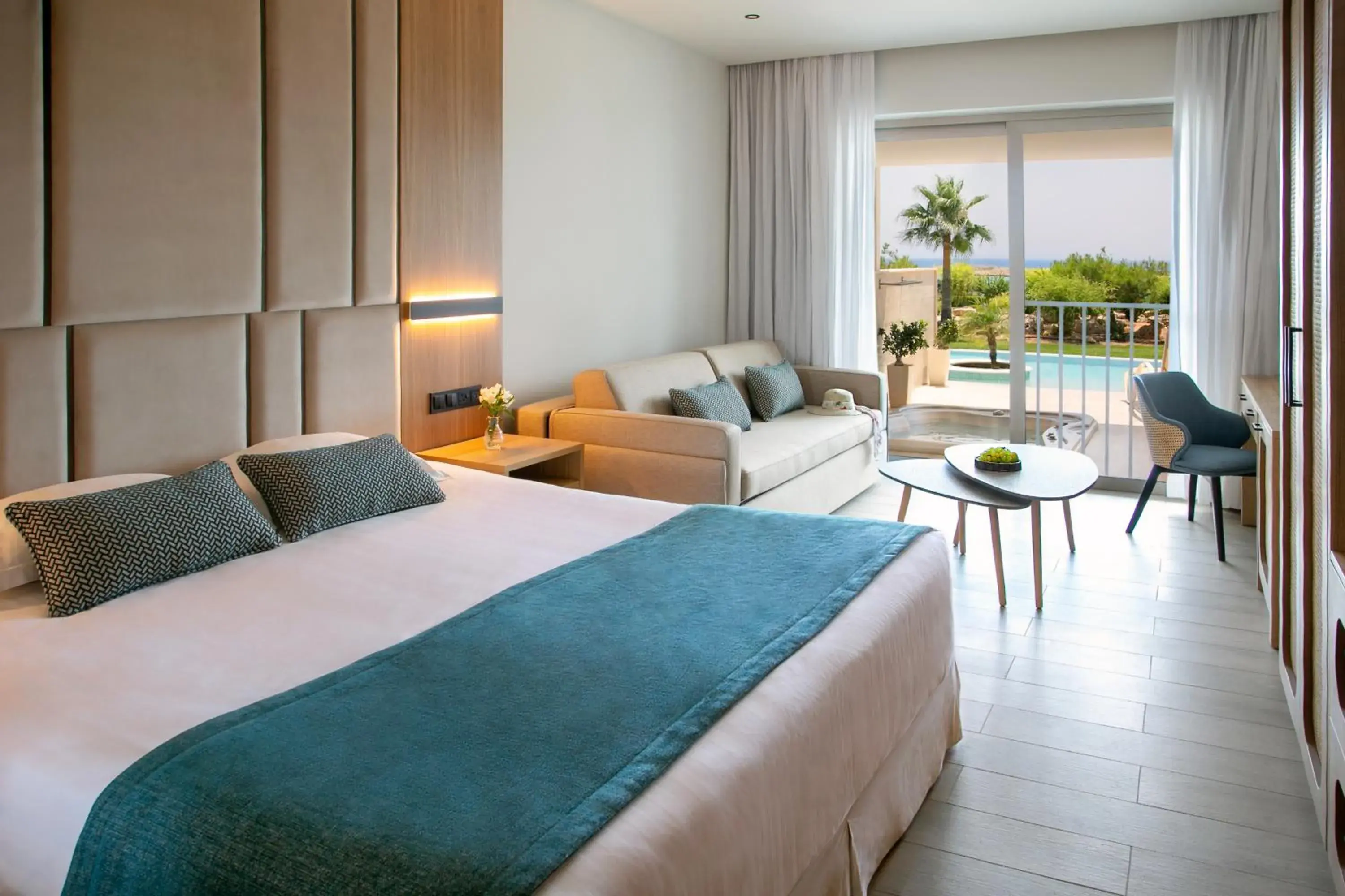 Bed in Asterias Beach Hotel