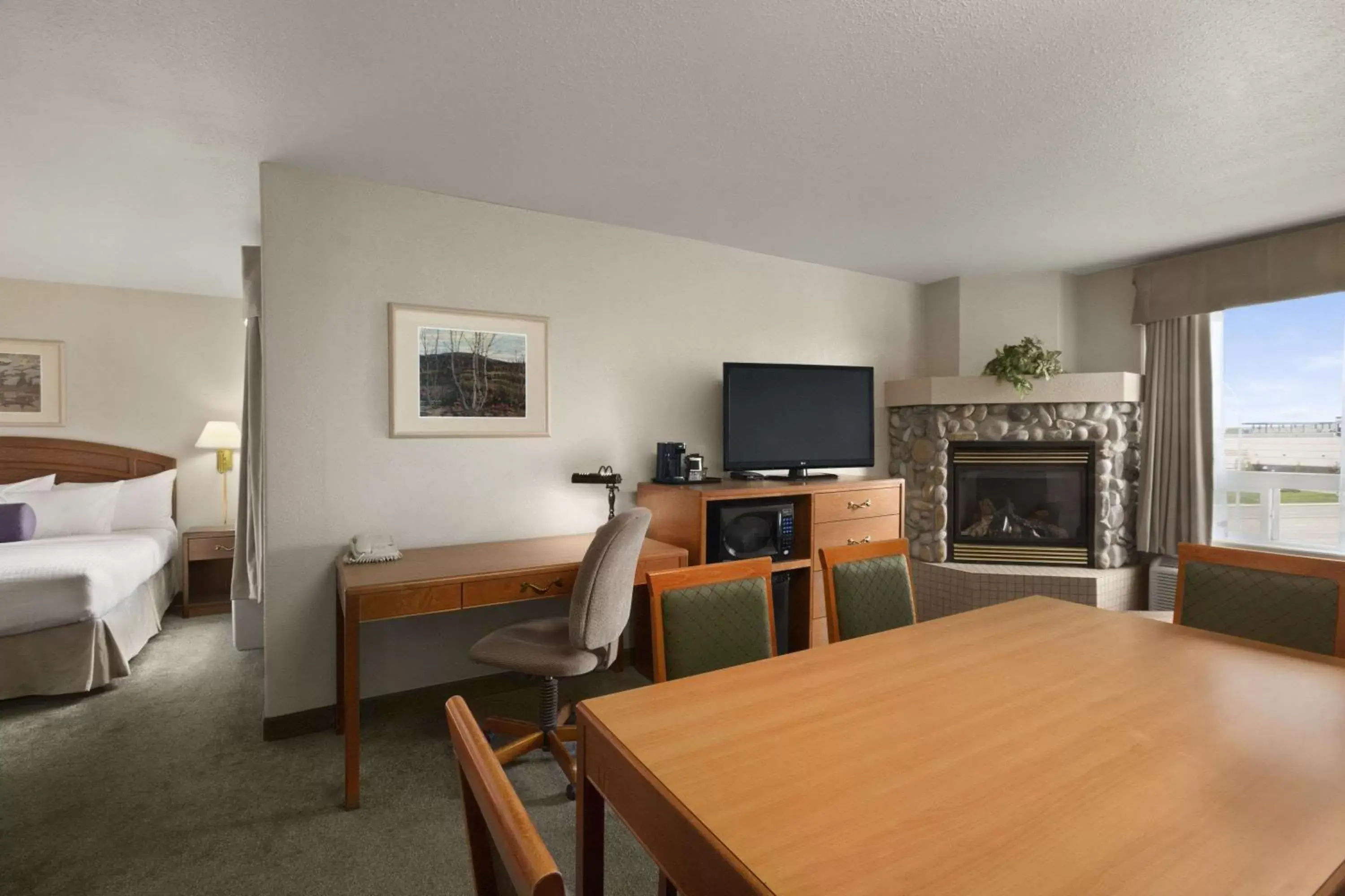 Photo of the whole room, TV/Entertainment Center in Days Inn by Wyndham Red Deer