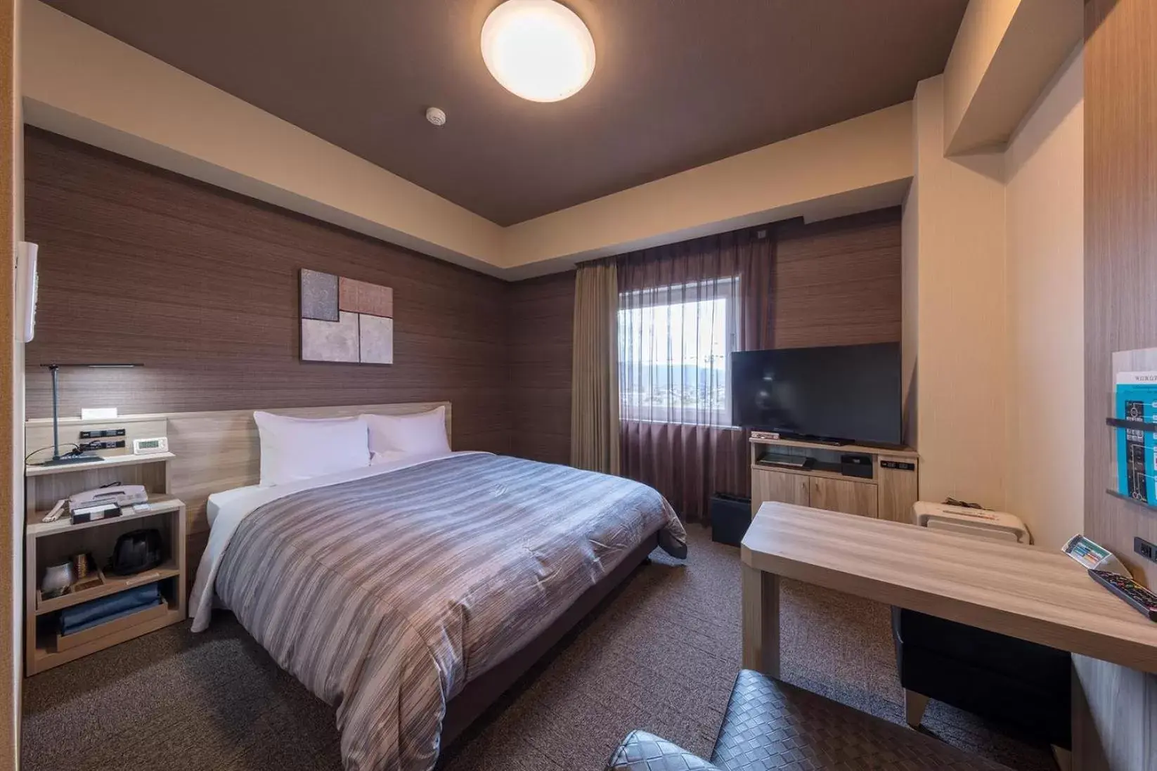 Photo of the whole room, Bed in Hotel Route-Inn Kurashiki Mizushima