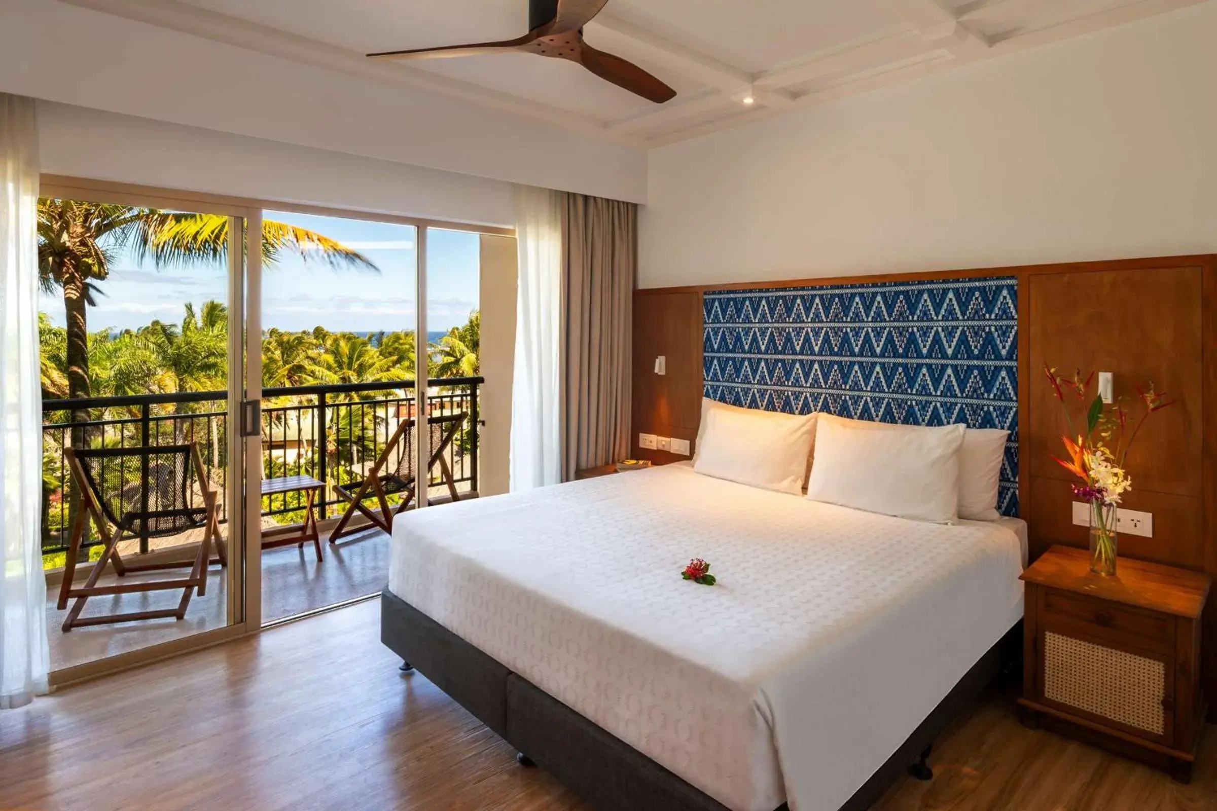 Photo of the whole room, Bed in Outrigger Fiji Beach Resort