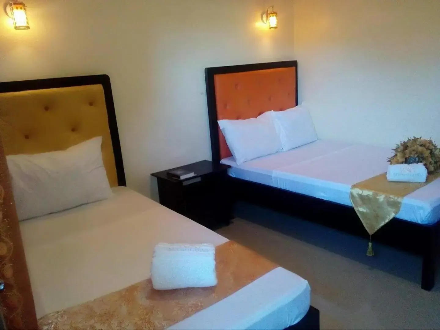 Photo of the whole room, Bed in RSG Microhotel