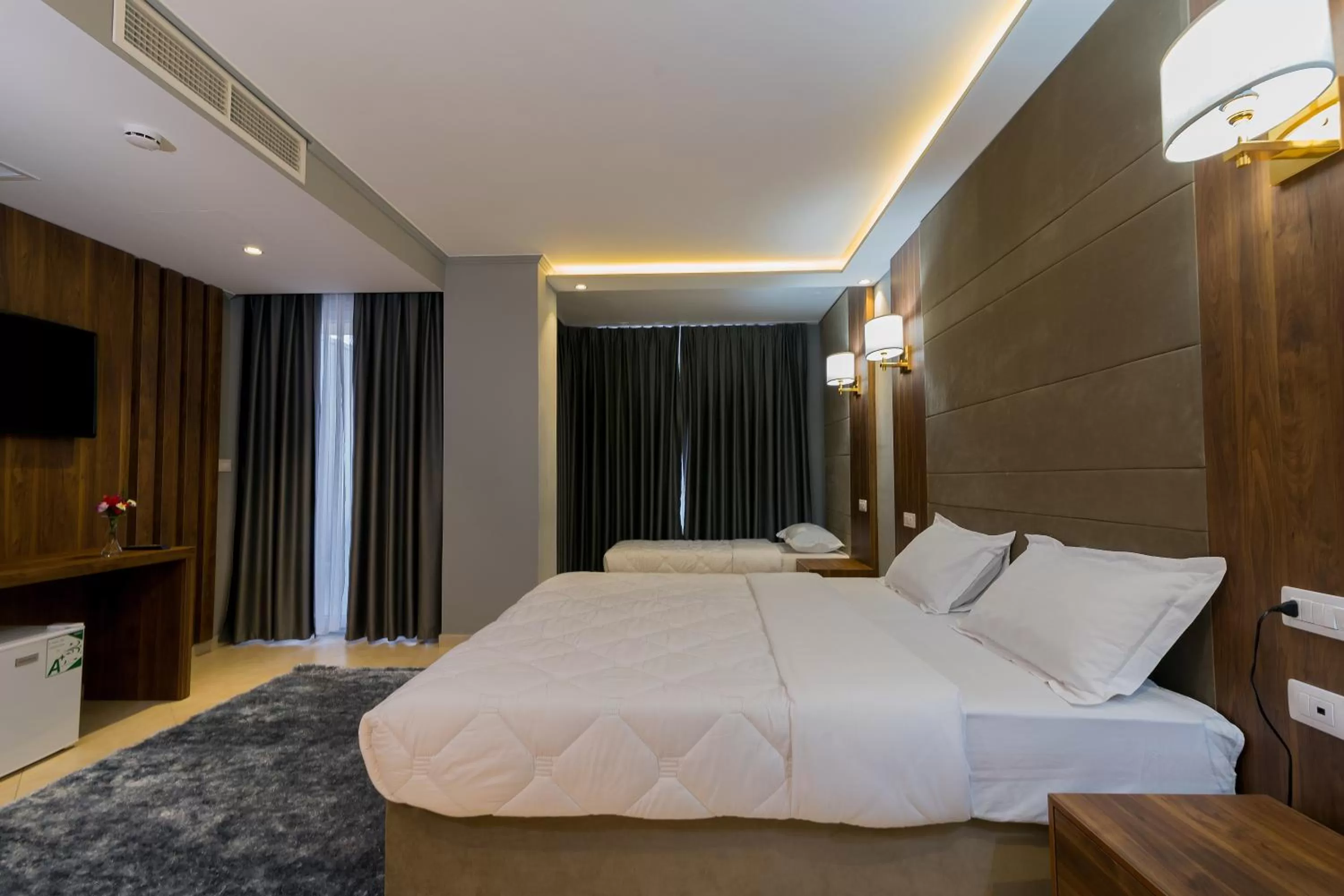 Photo of the whole room, Bed in Deluxe & Executive SPA by Rafaelo