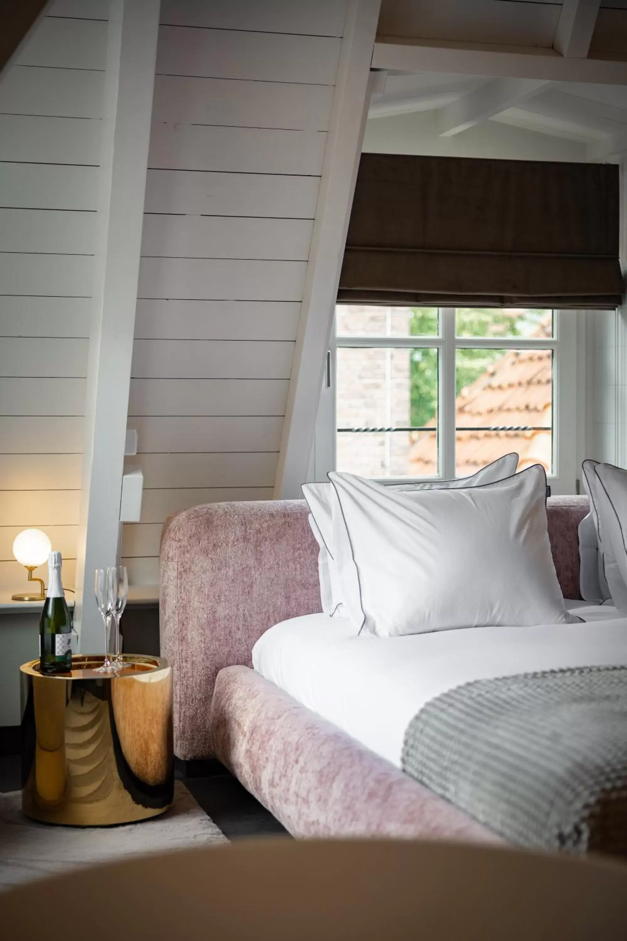 Bed, Seating Area in The Lemon Suites