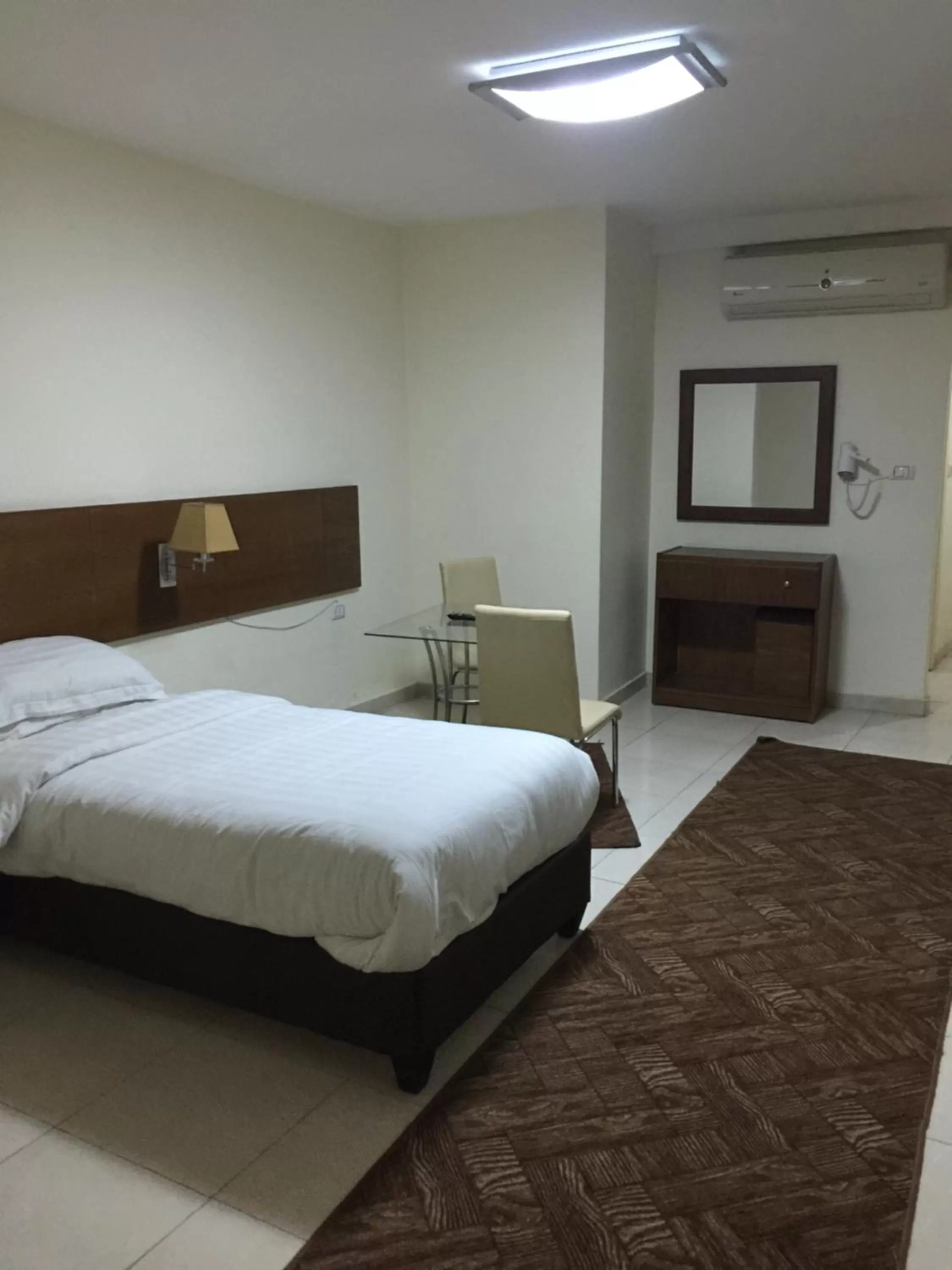 Bed in Zaina Plaza Hotel