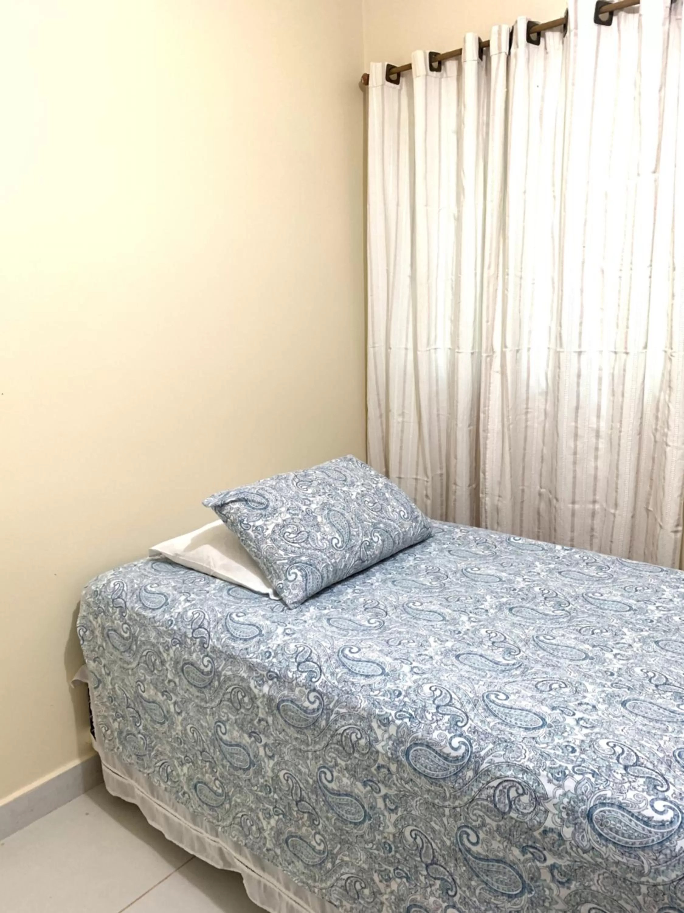 Bed in Pousada Jardim Brasília