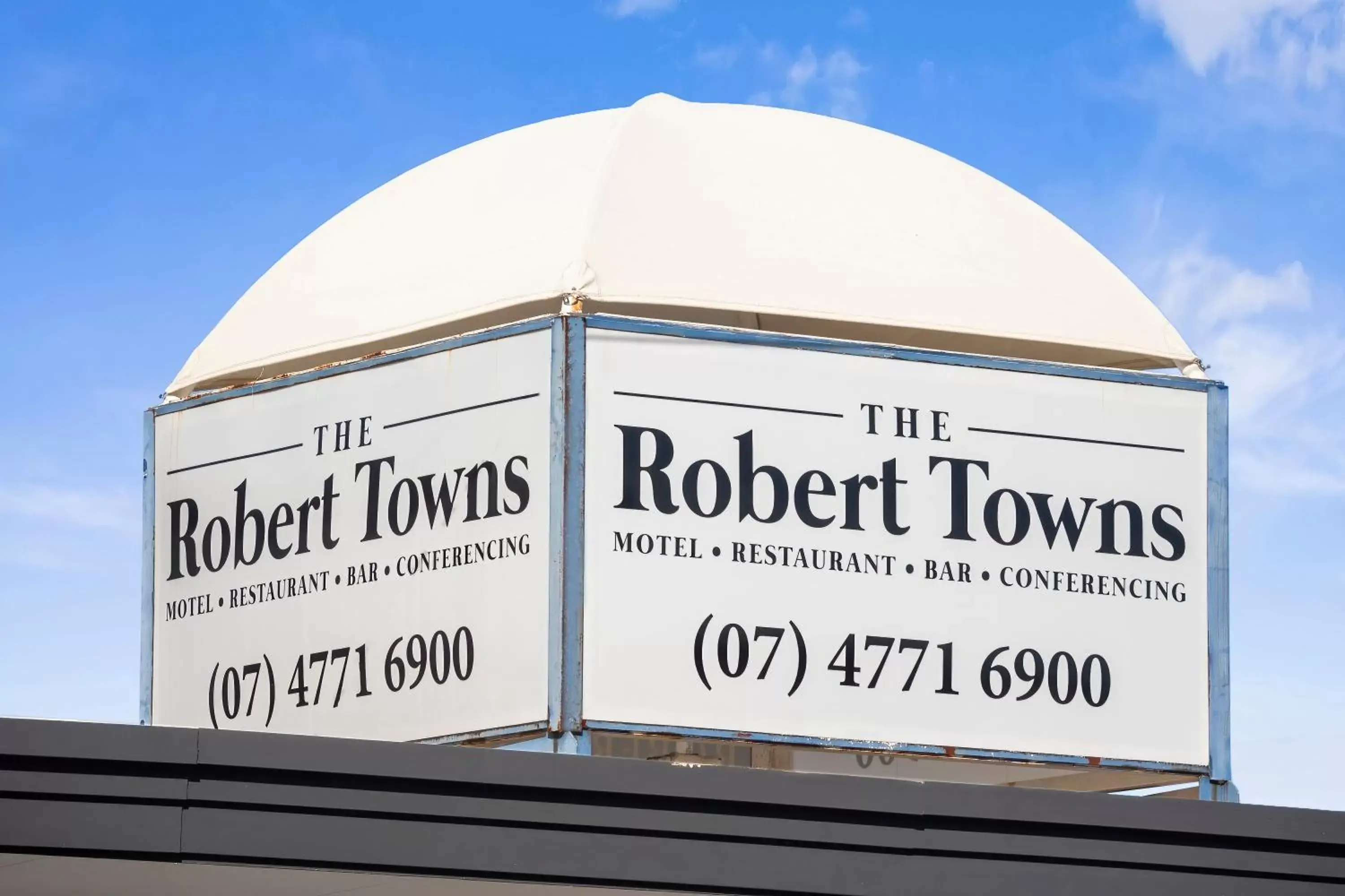 Property logo or sign in The Robert Towns