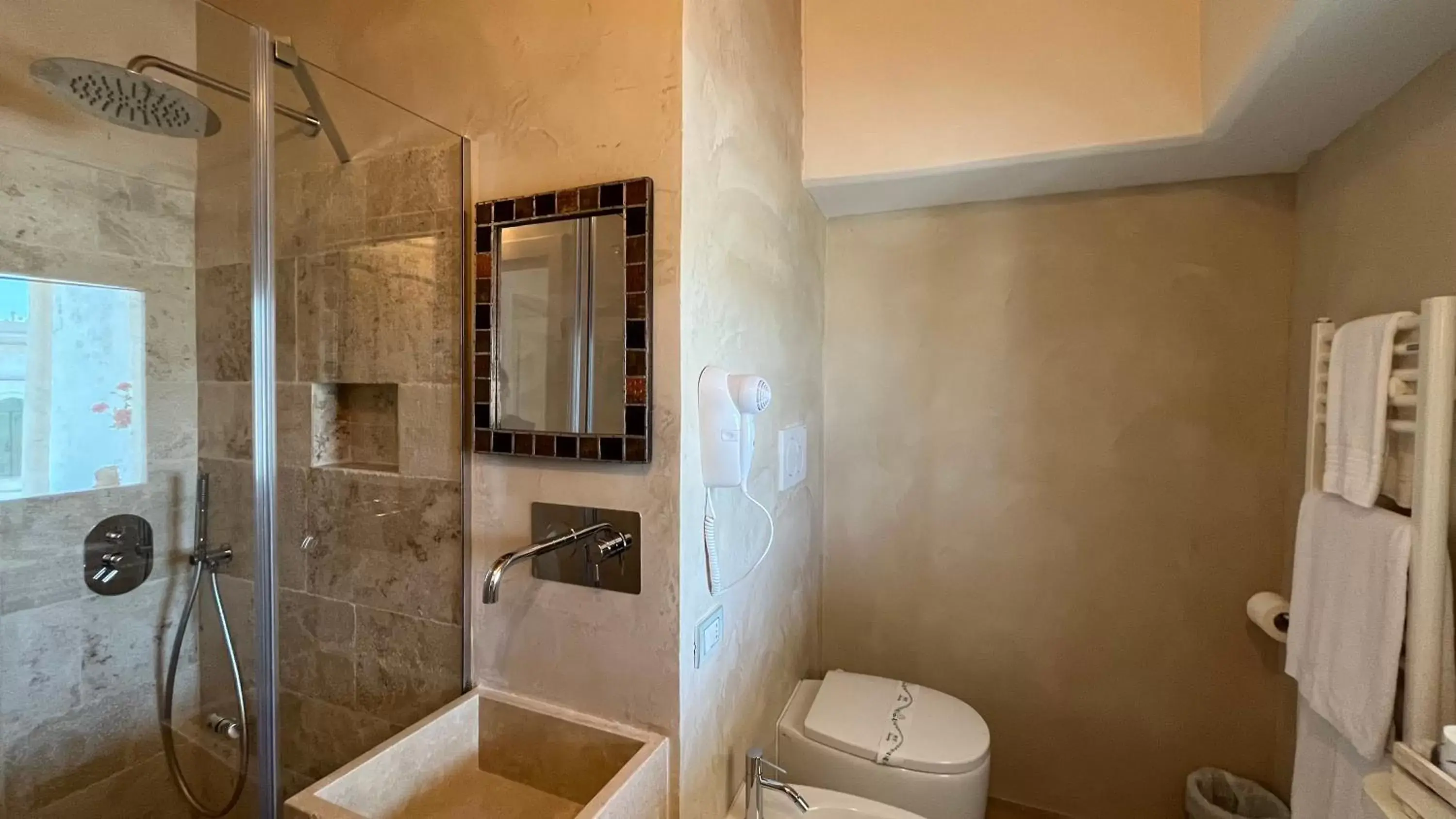 Bathroom in Antico Mondo Rooms & Suites