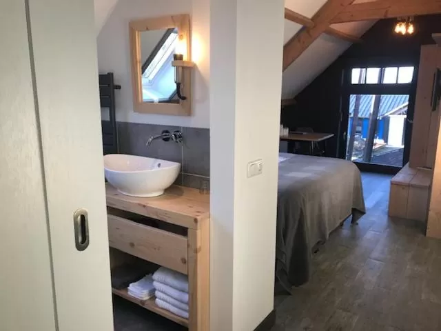 Bathroom in De Hostee