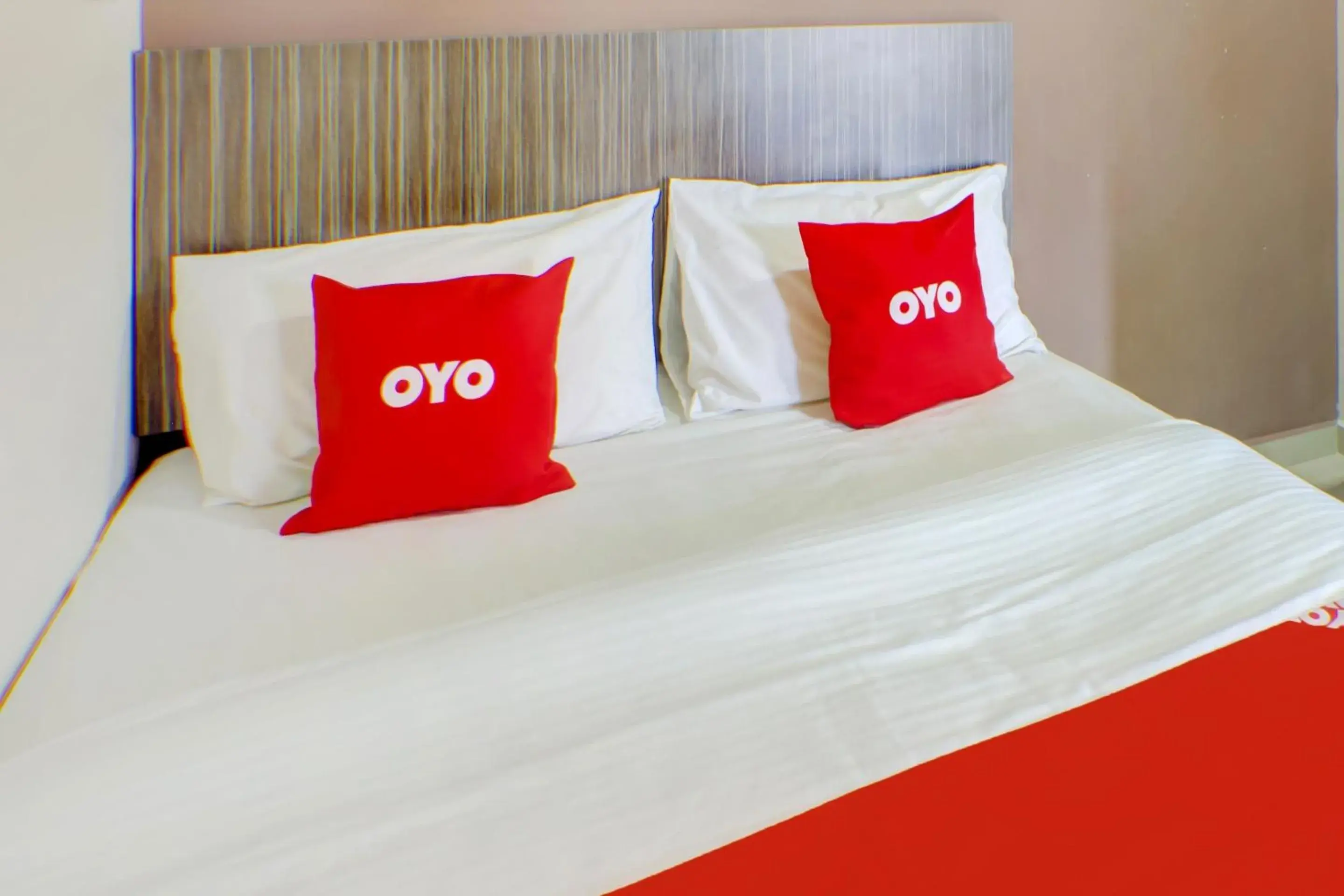 Bed in OYO 89985 Js Hotel