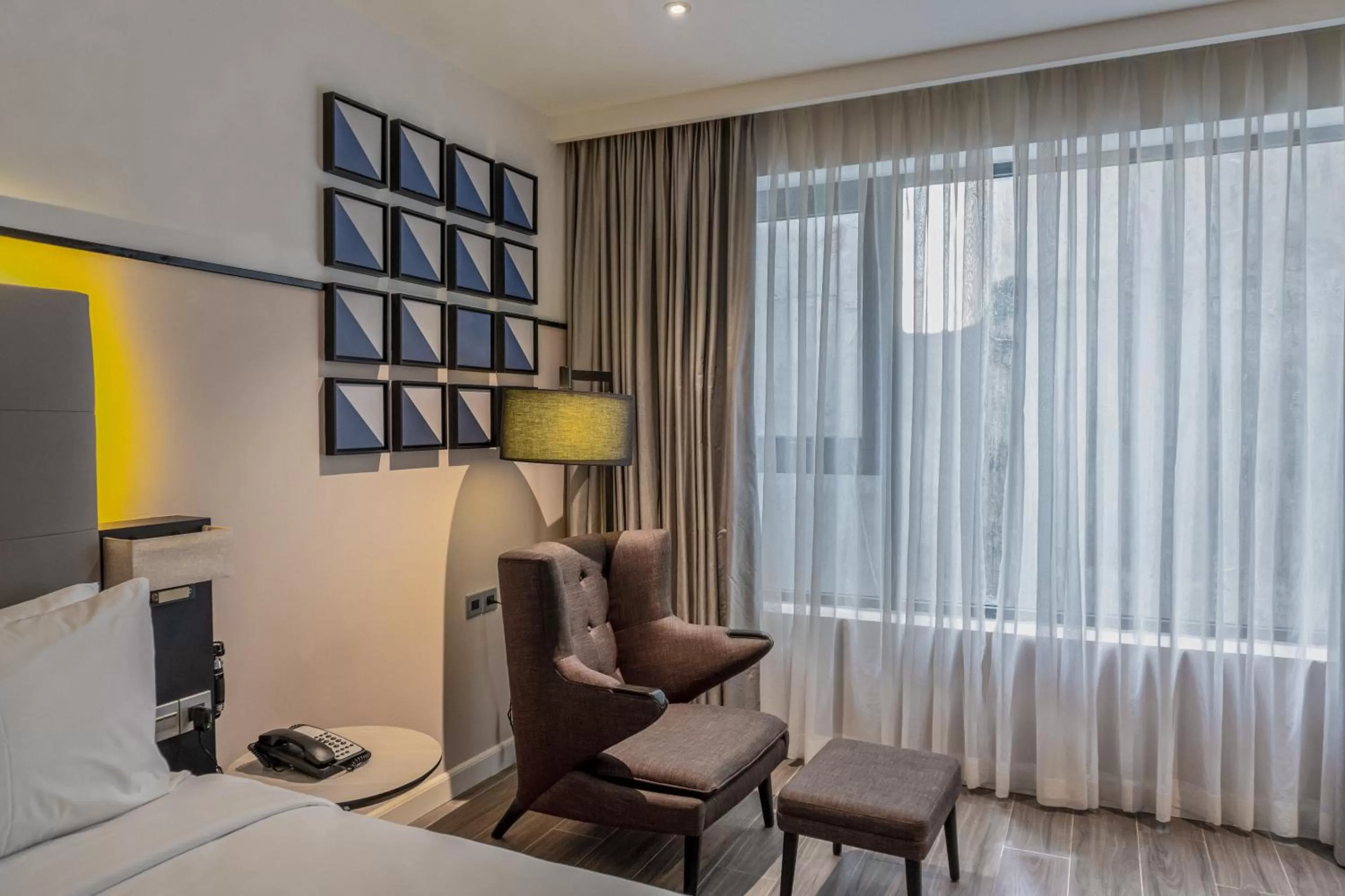 Seating area in M Village Hotel Tôn Thất Đạm