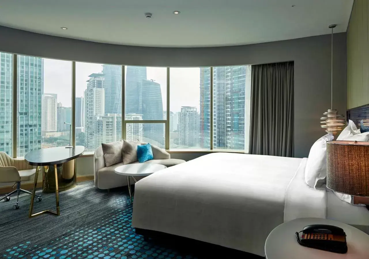 Bed in Pullman Kuala Lumpur City Centre Hotel & Residences