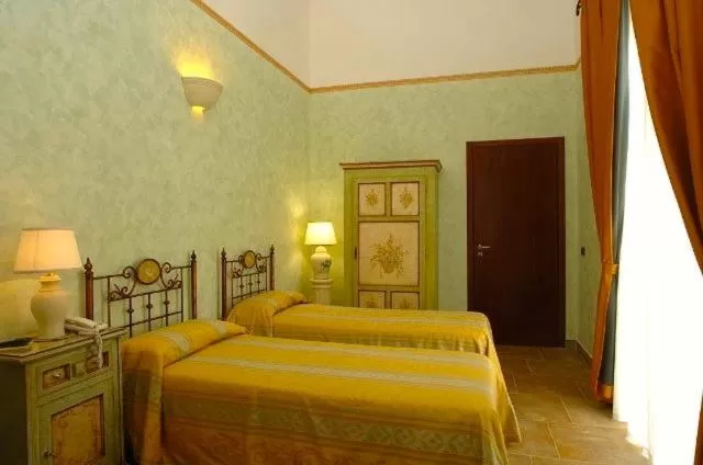 Bed in Grikò Country Hotel