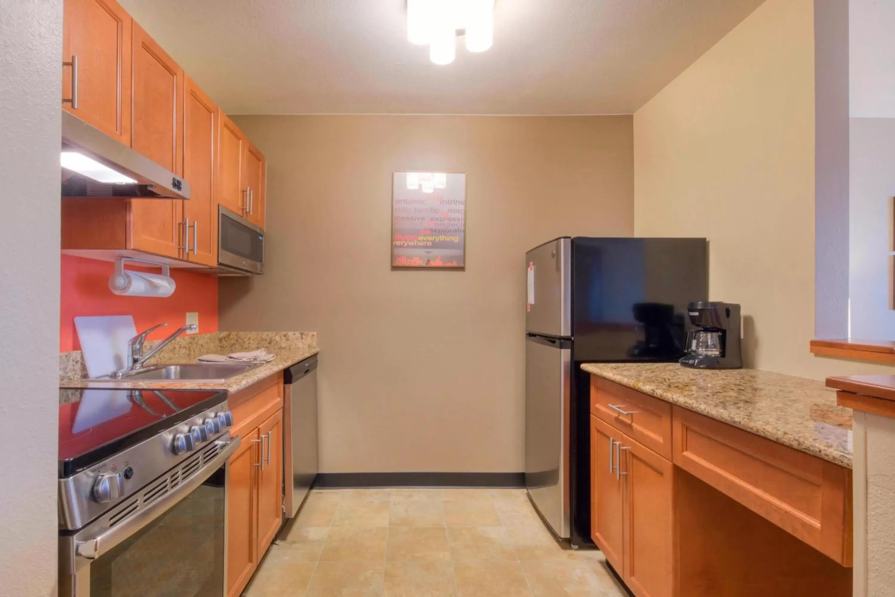 Bedroom, Kitchen/Kitchenette in TownePlace Suites Raleigh Cary/Weston Parkway