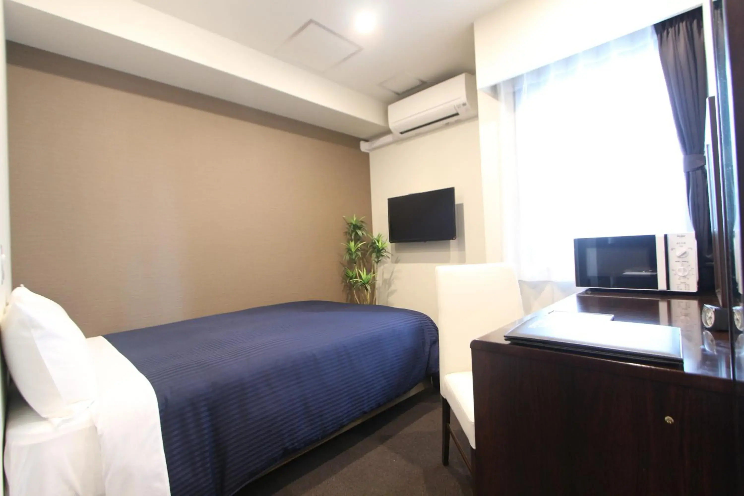 Photo of the whole room, TV/Entertainment Center in HOTEL LiVEMAX Higashi Ginza