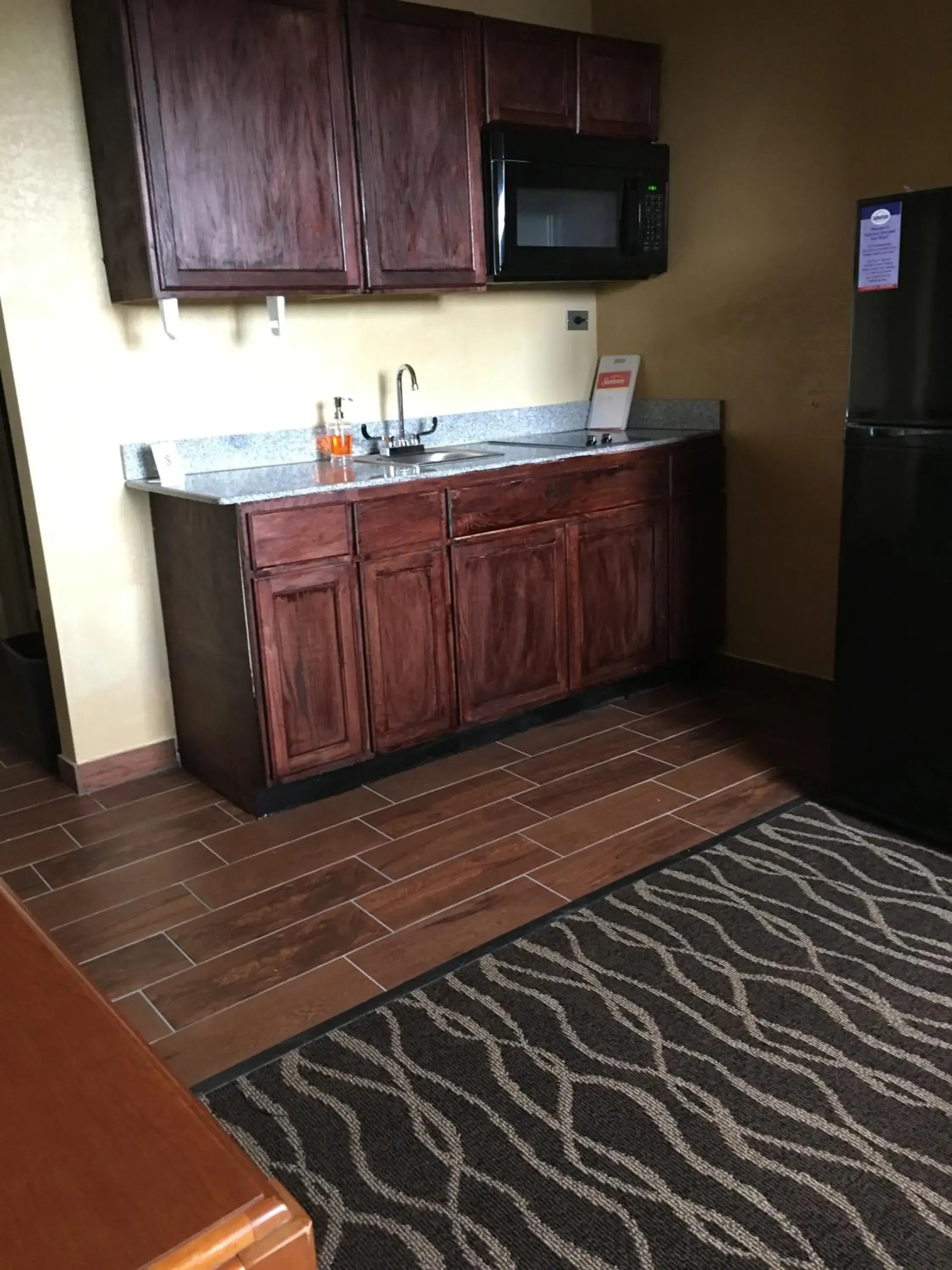 Kitchen or kitchenette, Kitchen/Kitchenette in Suburban Studios Fort Wayne