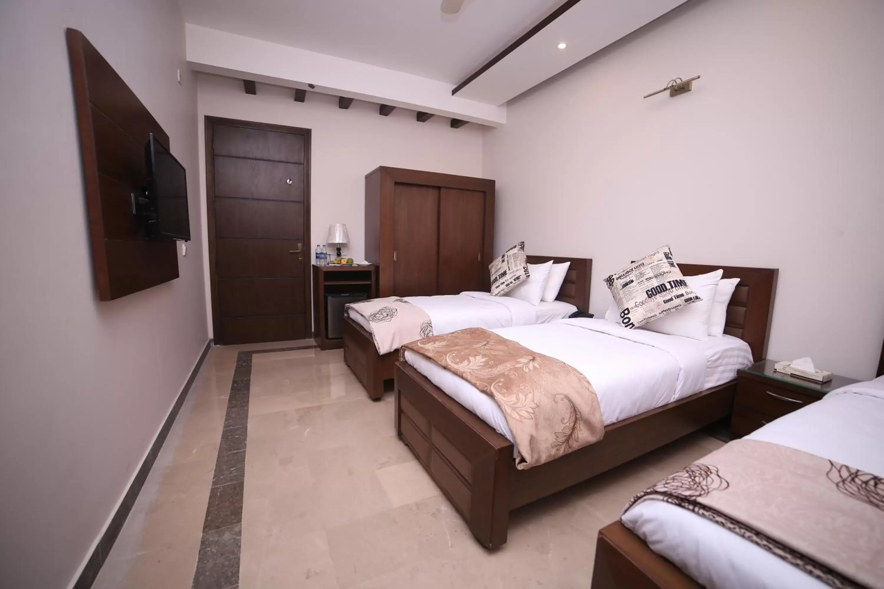 Bed in Zifan Hotel & Suites