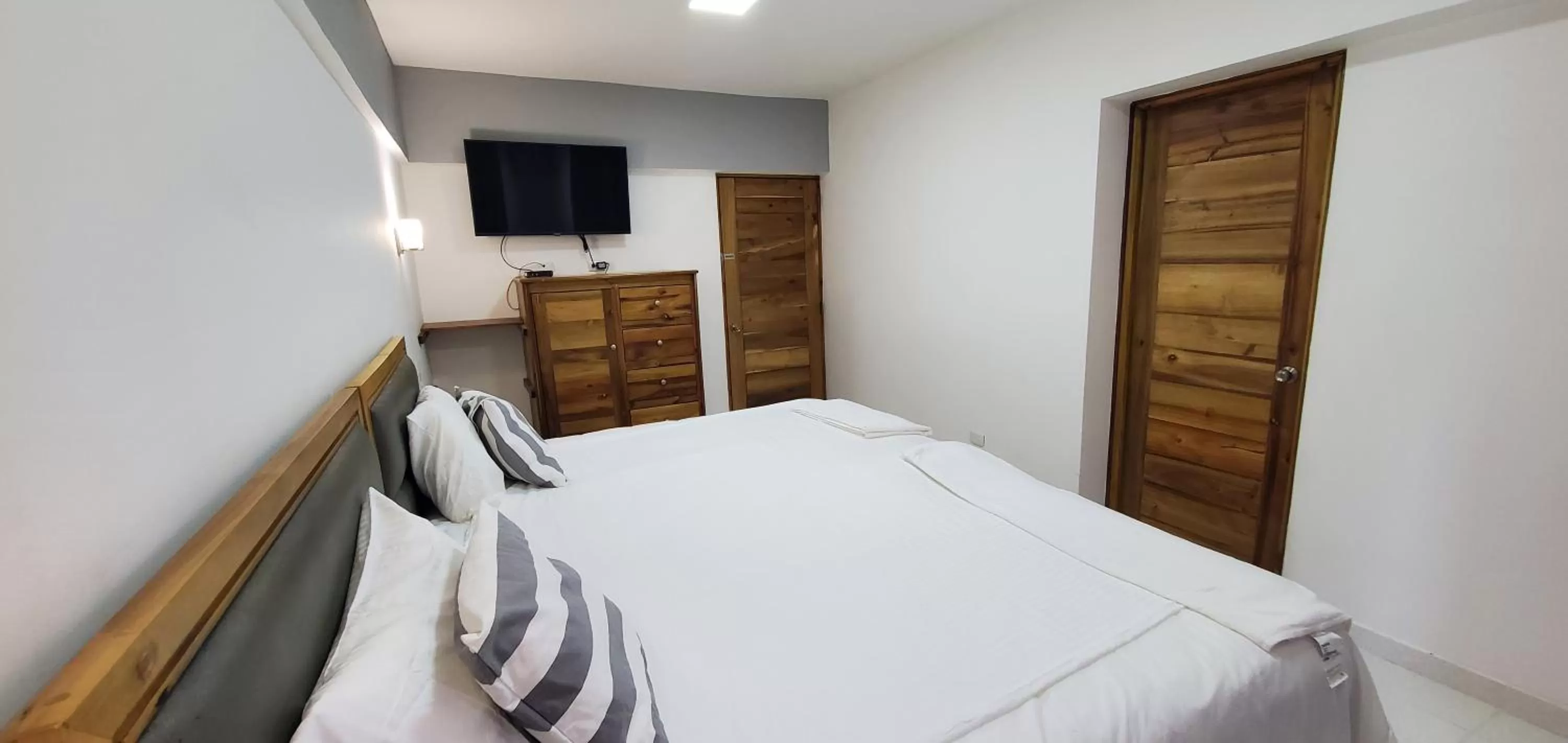 Bed in Boca Grande Hotel Suites