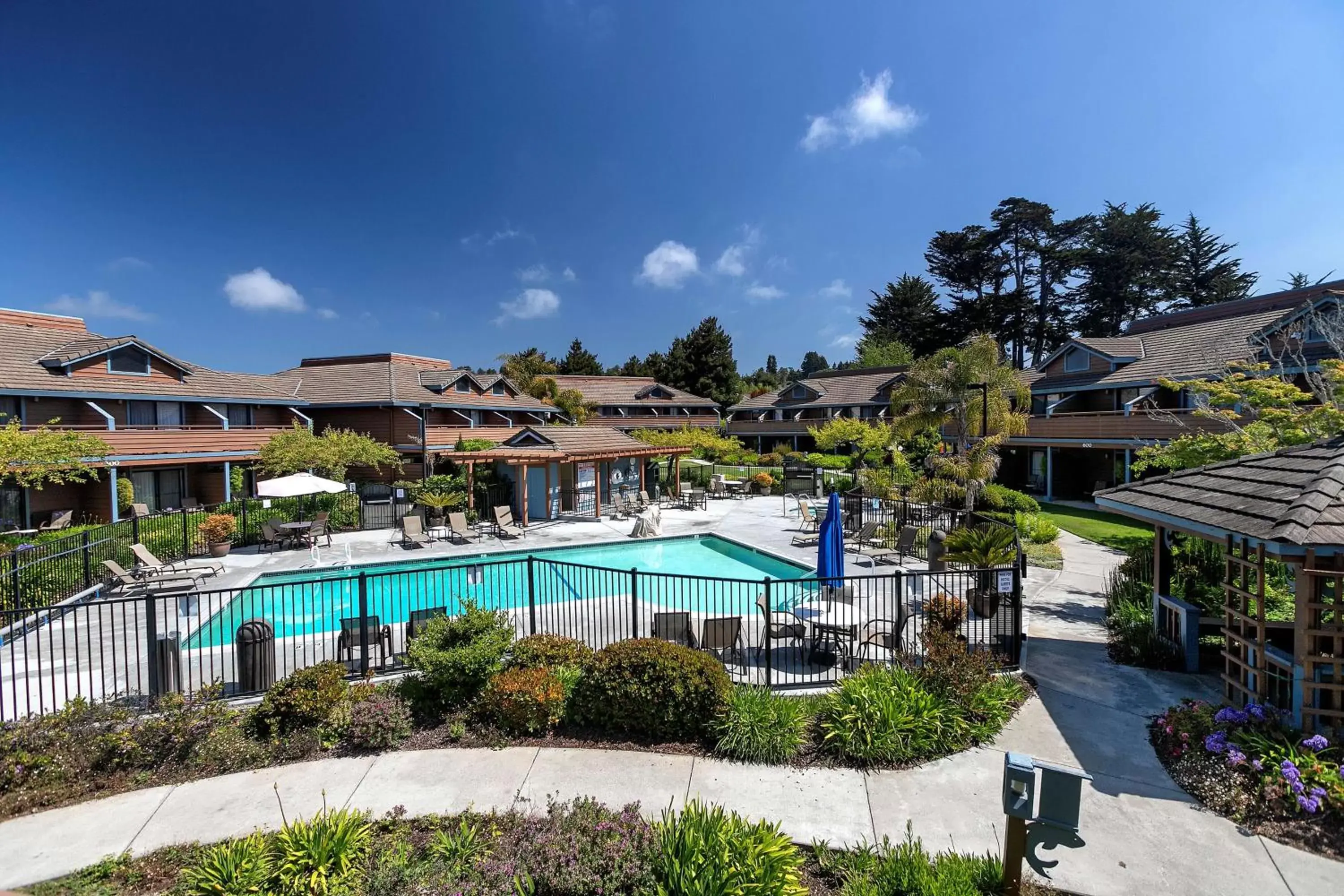 Pool View in Seacliff Inn Aptos, Tapestry Collection by Hilton
