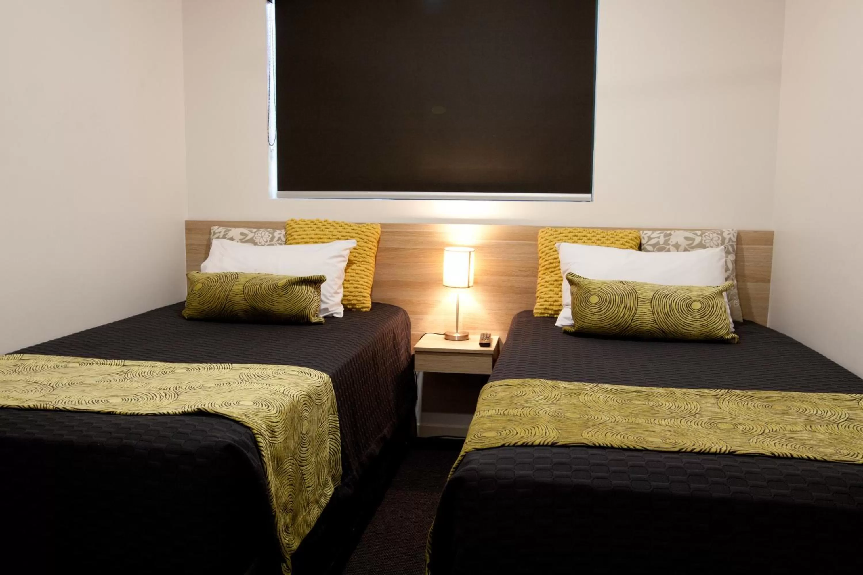 Seating area, Bed in Abode37 Motel Emerald