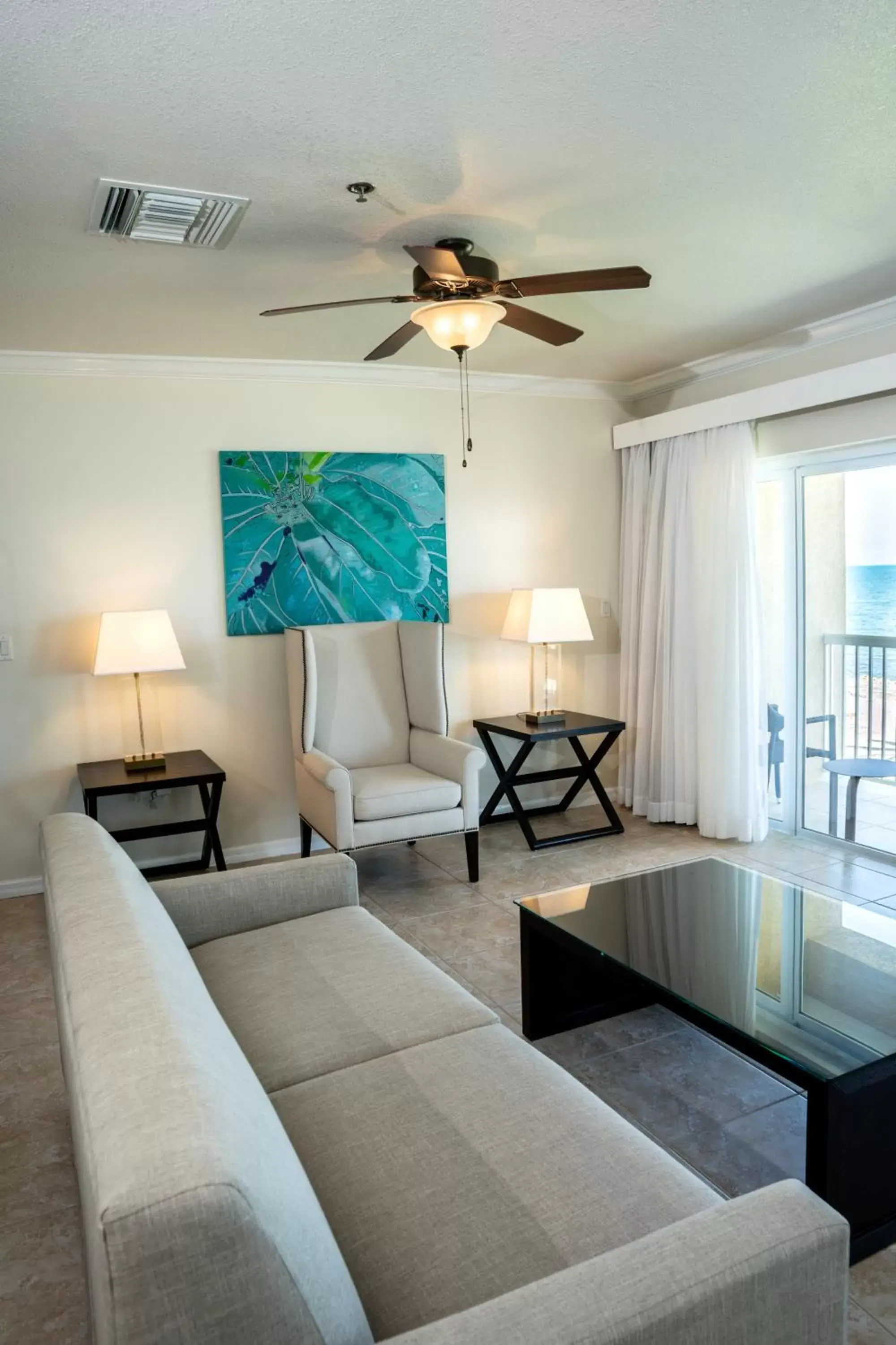 Living room, Seating Area in Holiday Inn Resort Grand Cayman, an IHG Hotel
