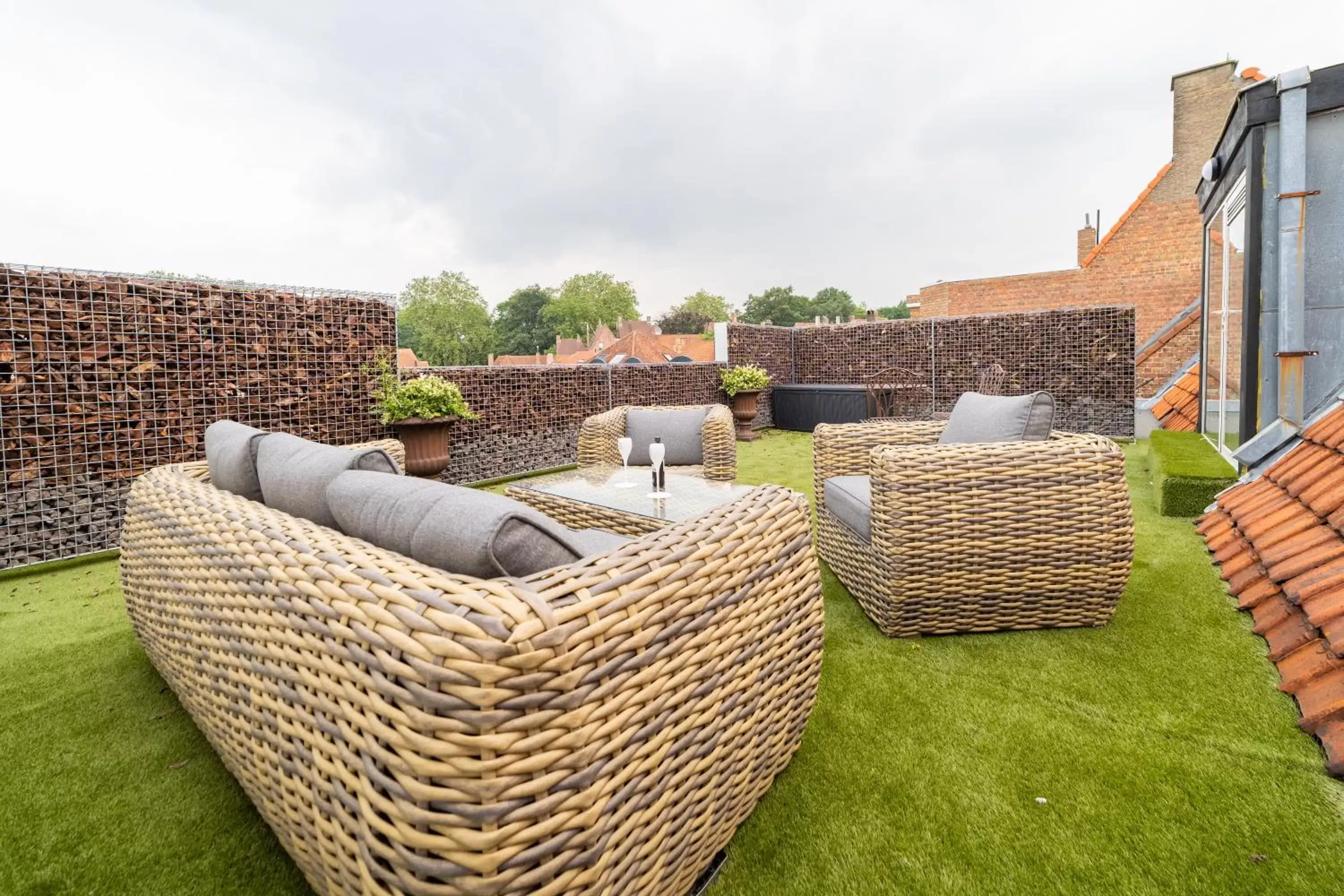 Patio in Grand Hotel Normandy by CW Hotel Collection