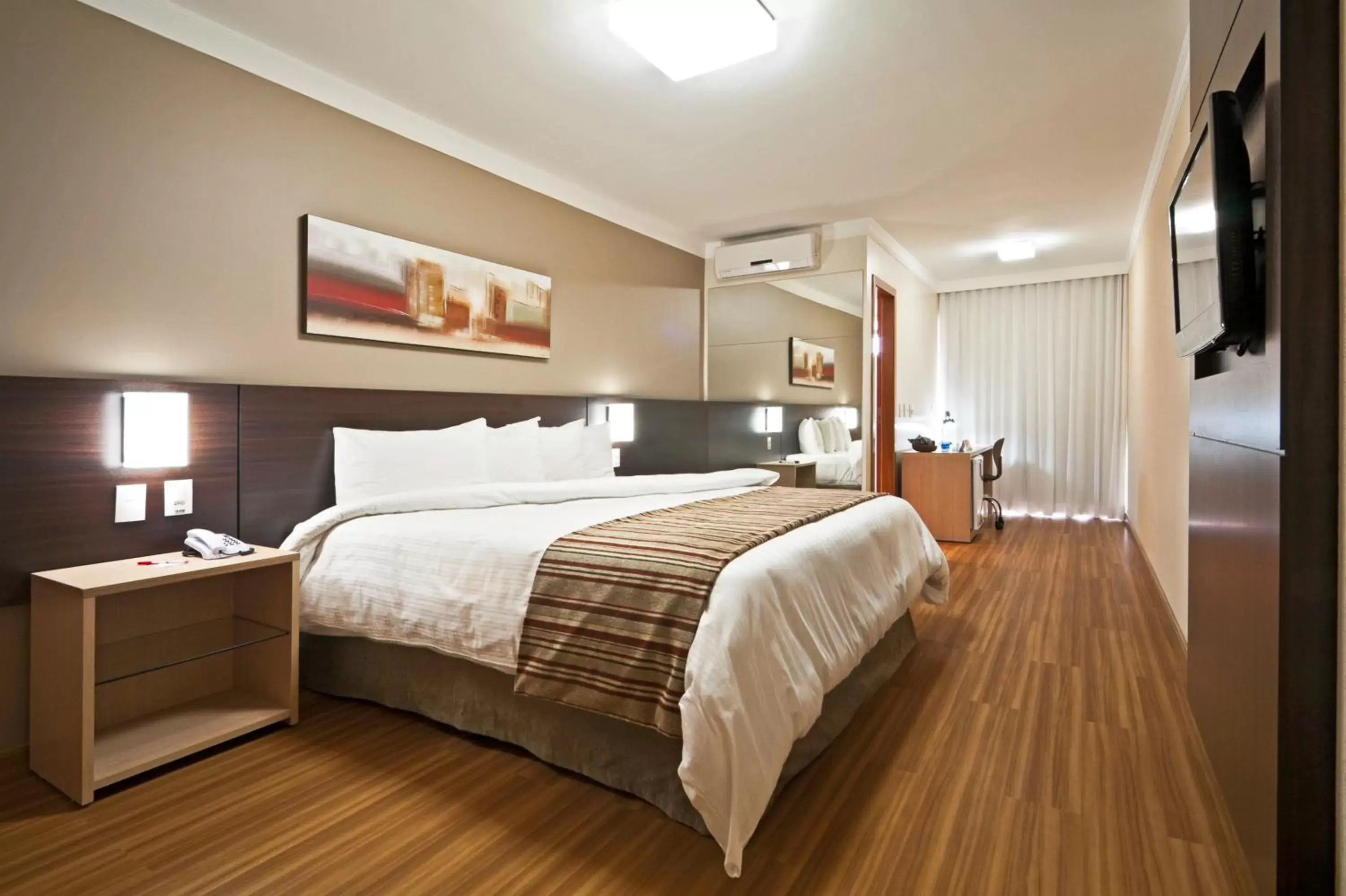Bed in Ramada Hotel & Suites Lagoa Santa By Wyndham Bed in Ramada Hotel & Suites Lagoa Santa By Wyndham
