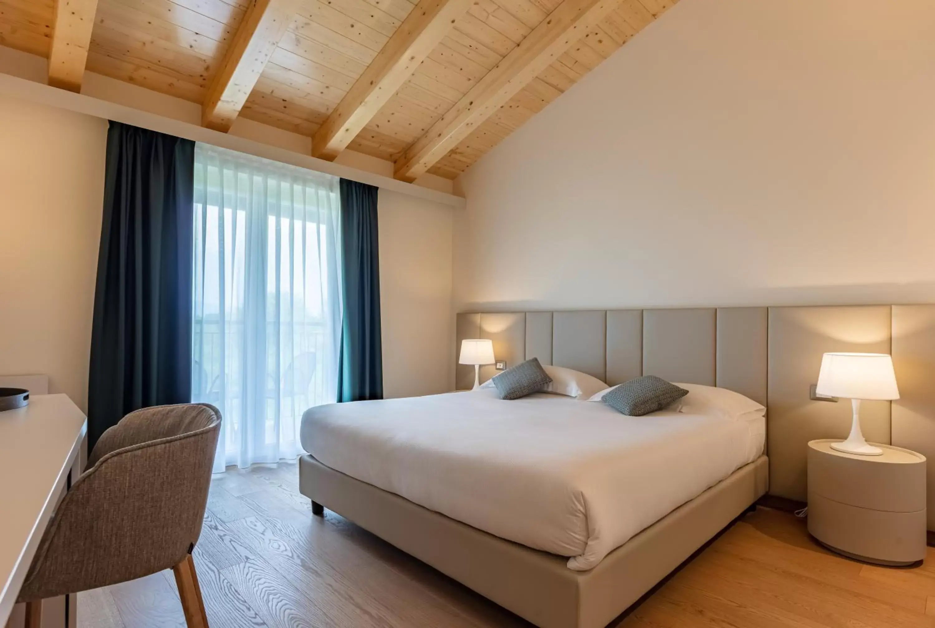 Photo of the whole room, Bed in Leonardo Hotel Lago di Garda - Wellness and Spa