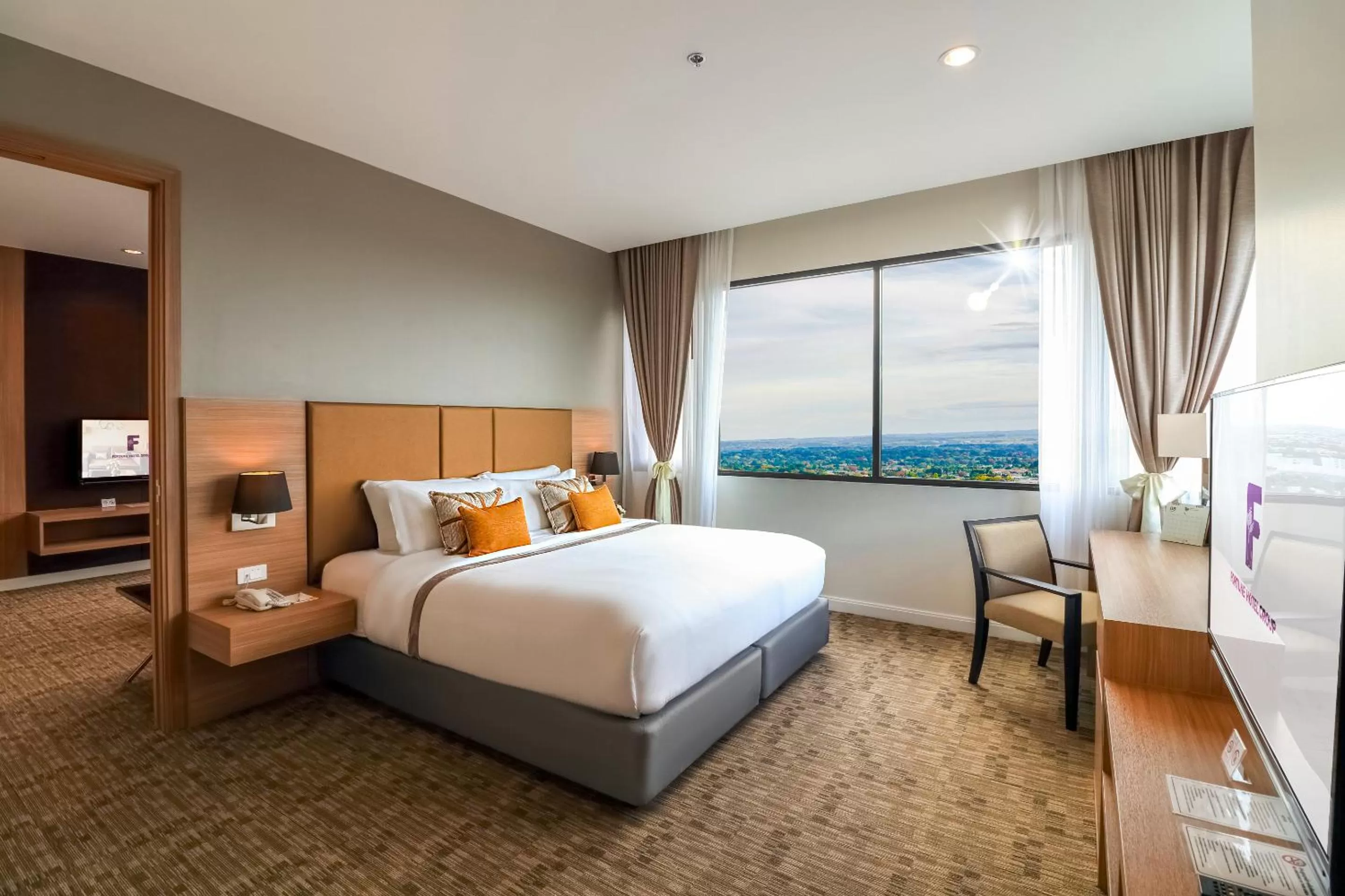 Photo of the whole room, Bed in Grand Fortune Hotel Nakhon Si Thammarat