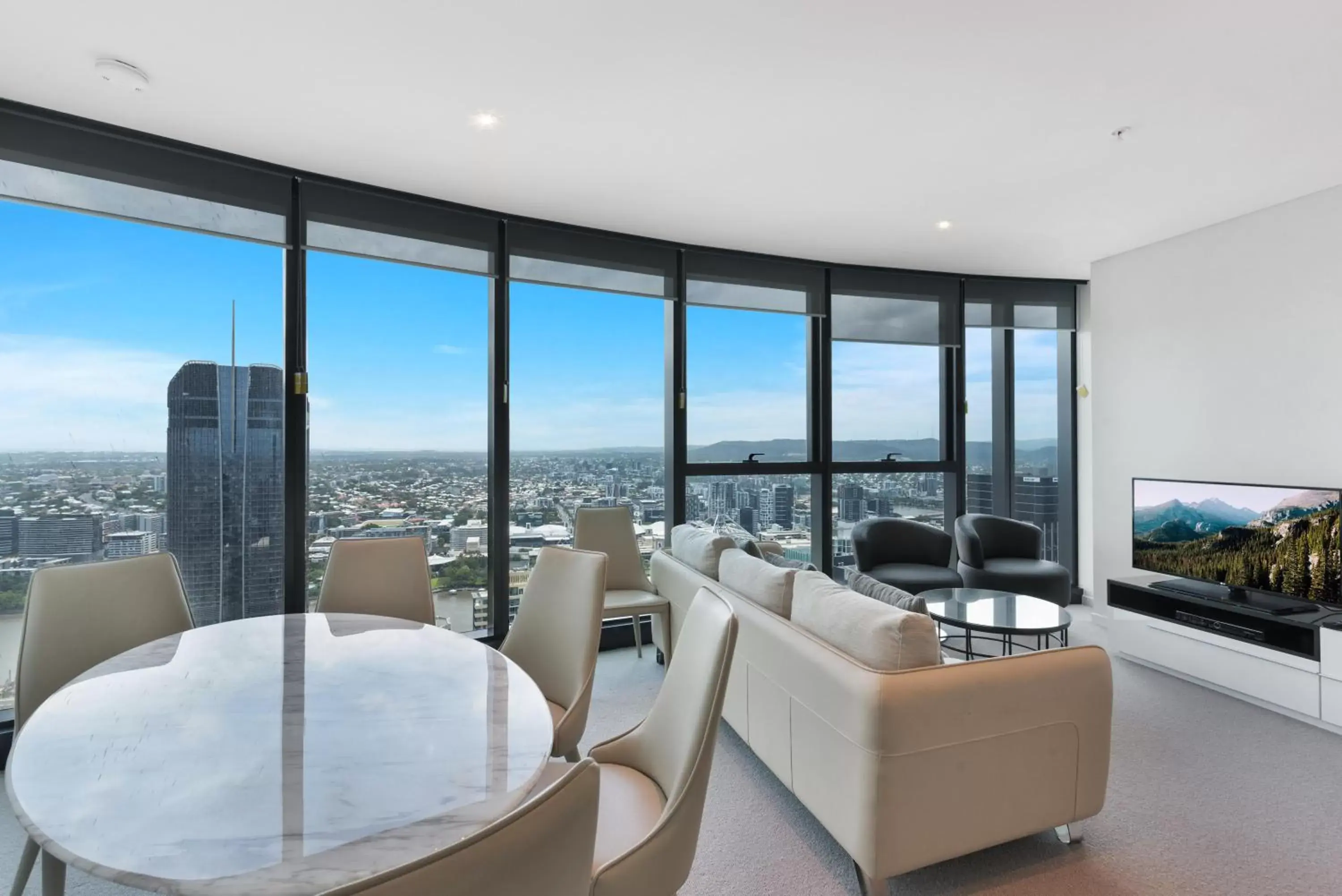 Living room in Brisbane Skytower by CLLIX